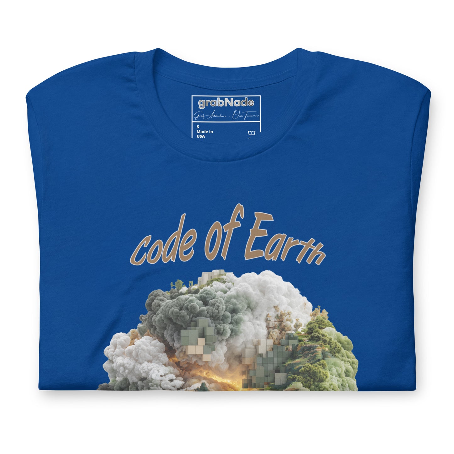 Product mockup. Folded royal blue T-shirt displaying the “code of Earth” slogan above a stylized planet illustration of smoke, trees, and digital pixels.