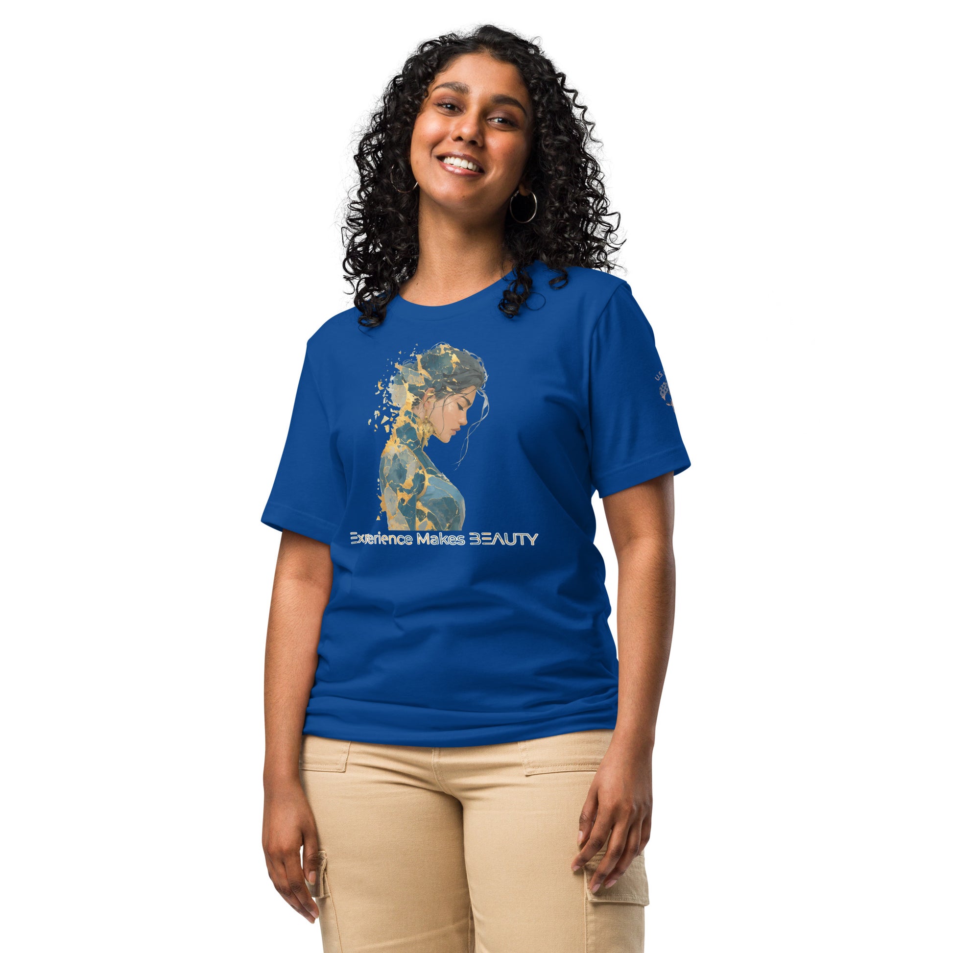Product mockup. Woman wearing a blue T-shirt featuring an abstract portrait of a woman with "Experience Makes BEAUTY" text.