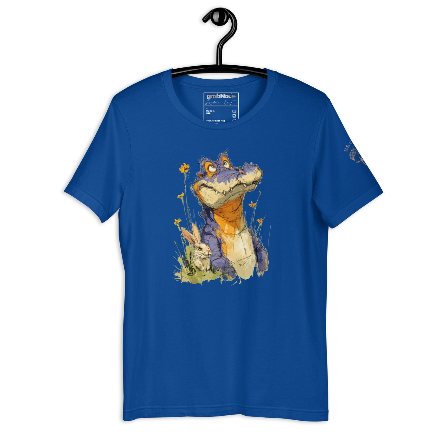 Product mockup. Royal blue T-shirt on a hanger, displaying a smiling cartoon alligator and a rabbit among tall yellow flowers.