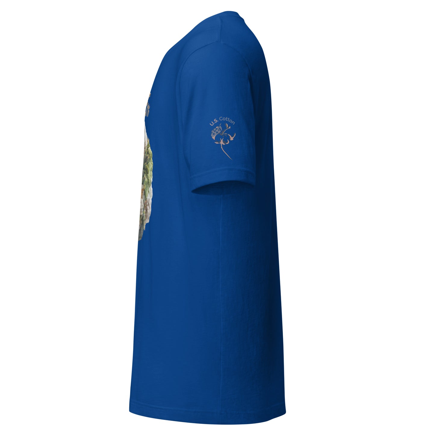 Product mockup. Left side of a blue T-shirt with a white cotton boll and “U.S. Cotton” logo on the sleeve; part of a green-and-brown chest graphic is visible.