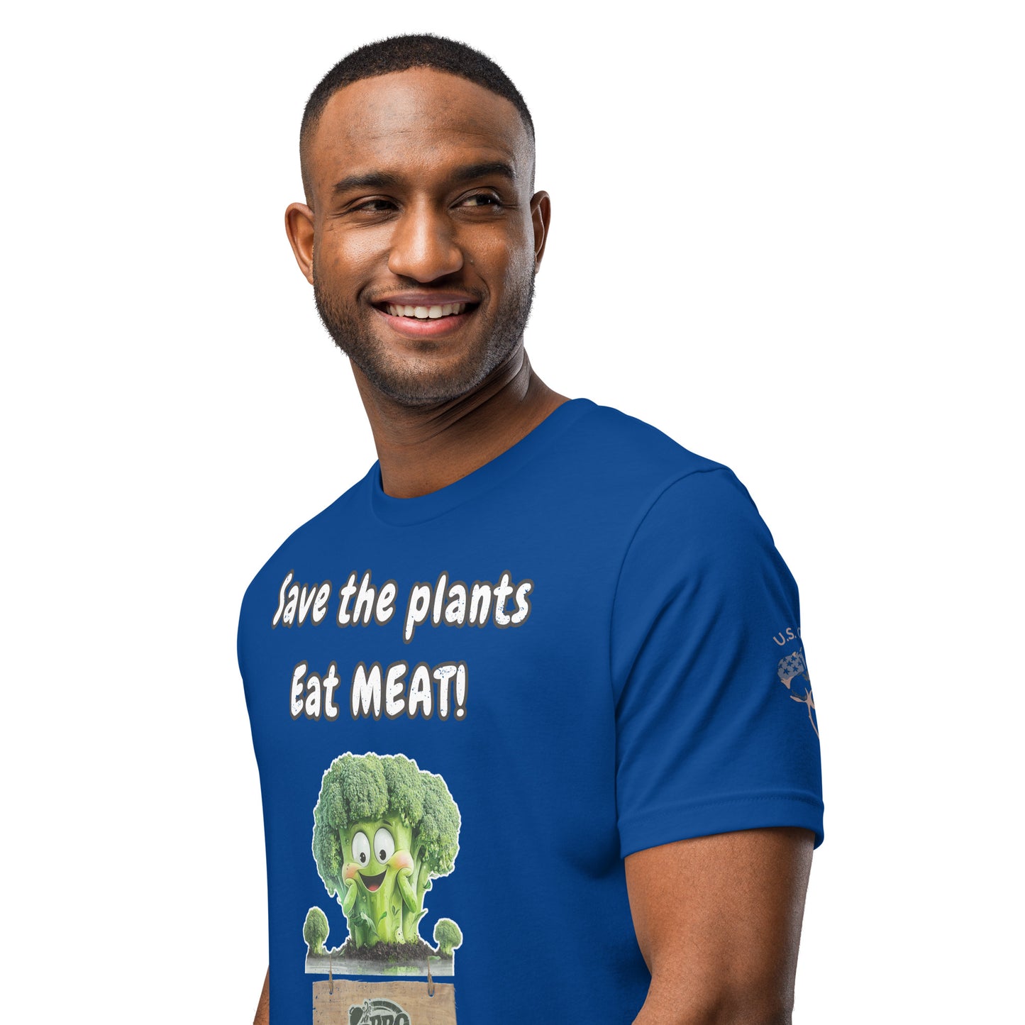 Product mockup. Left front view of a blue T-shirt with “U.S. Cotton” logo on the sleeve, and a partially visible cartoon broccoli character in a crate, close-up from the torso up.