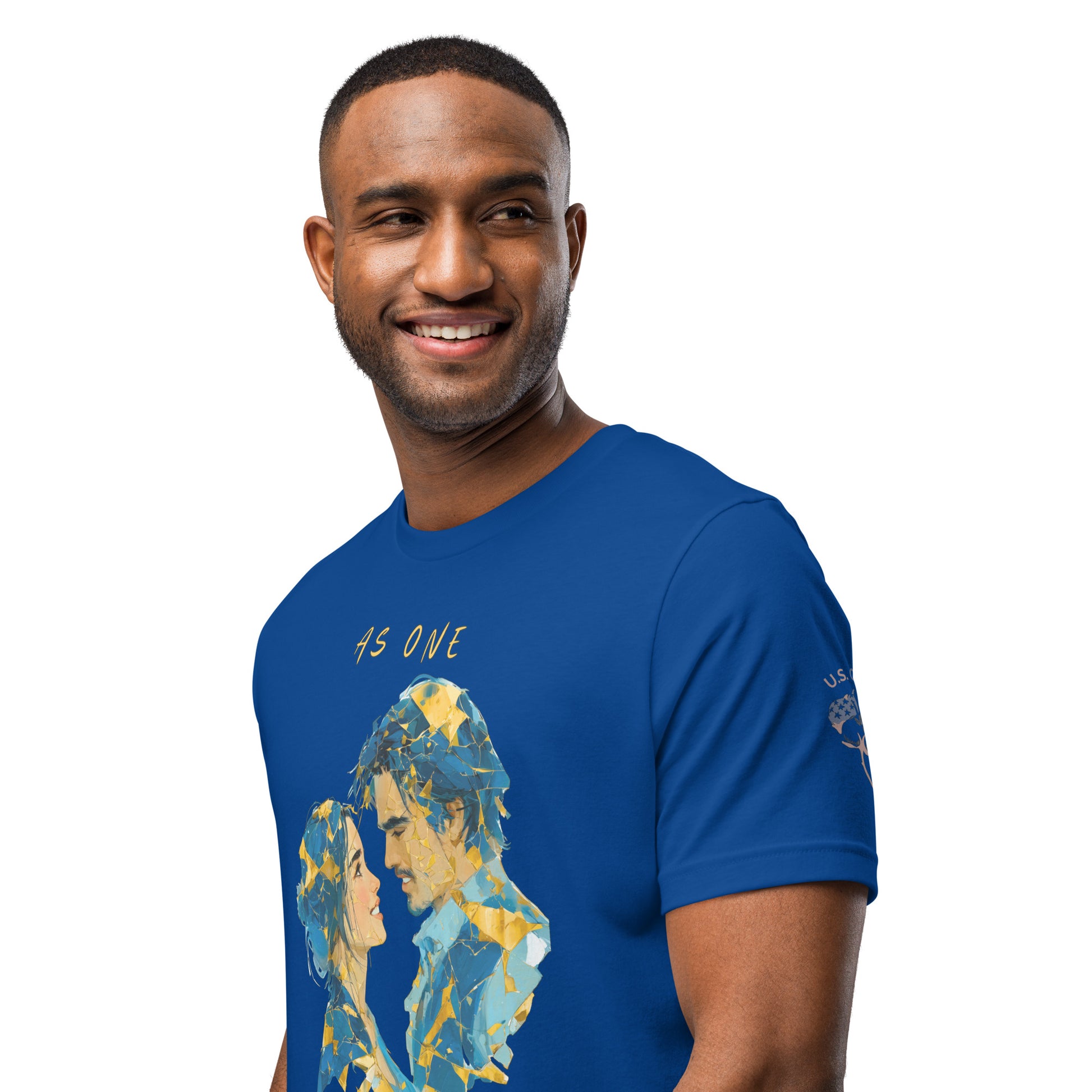 Product mockup. Blue T-shirt, left front view, displaying a gold, blue, and yellow illustration of two faces forming a heart with the words “AS ONE” above, close-up from the torso up.