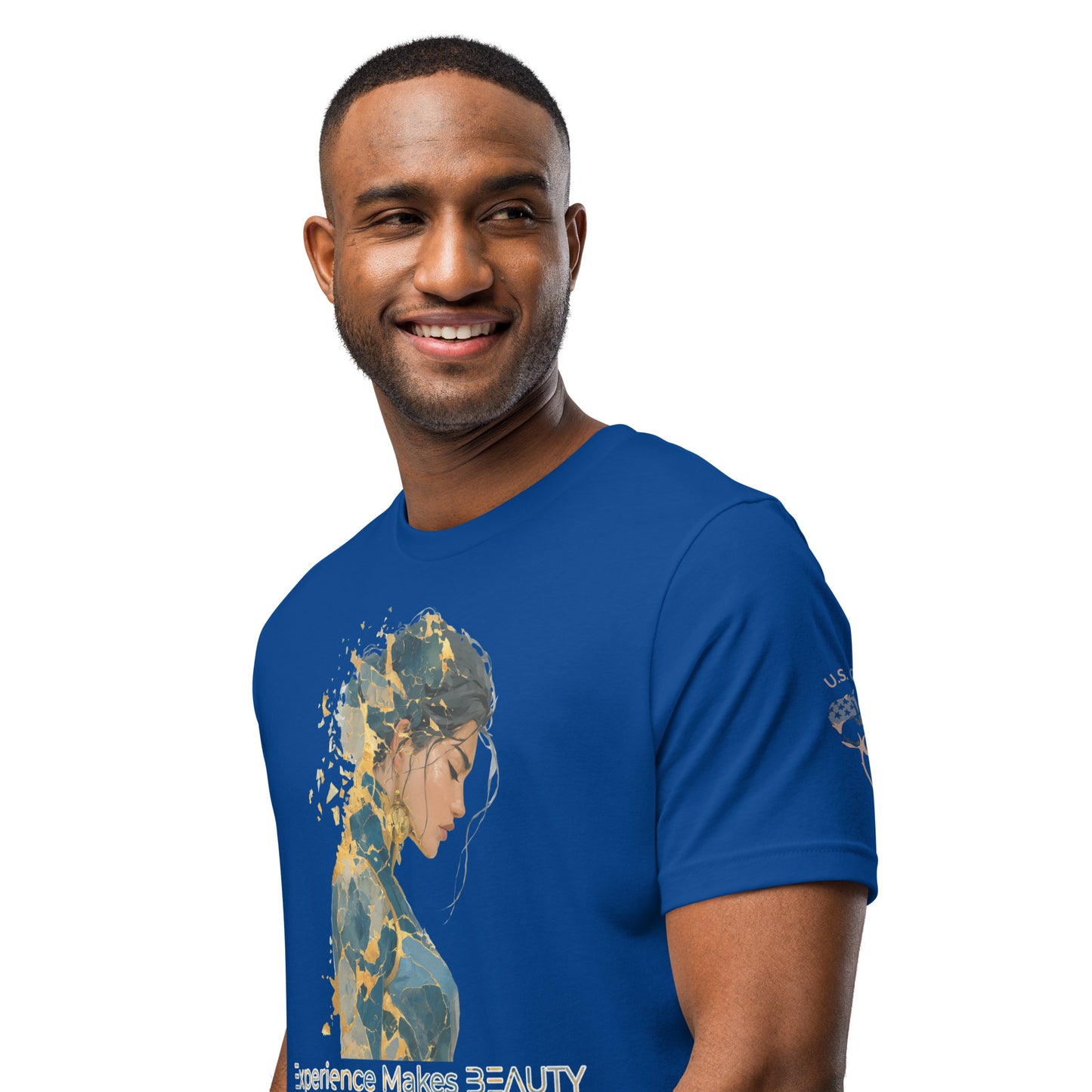 Product mockup. Blue T-shirt, left front, with abstract silhouette of a woman in blue, tan, and gold, and the words “Experience Makes BEAUTY.”, close-up from the torso up.
