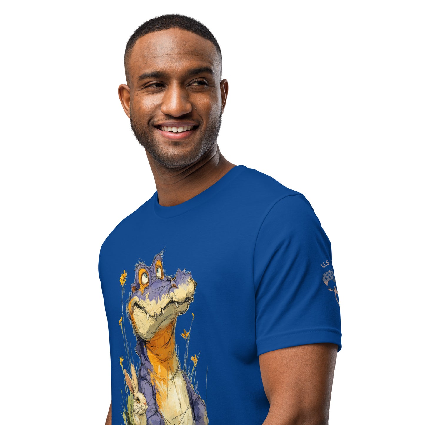 Product mockup. A man wearing a blue T-shirt with a large, colorful cartoon alligator illustration on the chest, shown from the waist up.