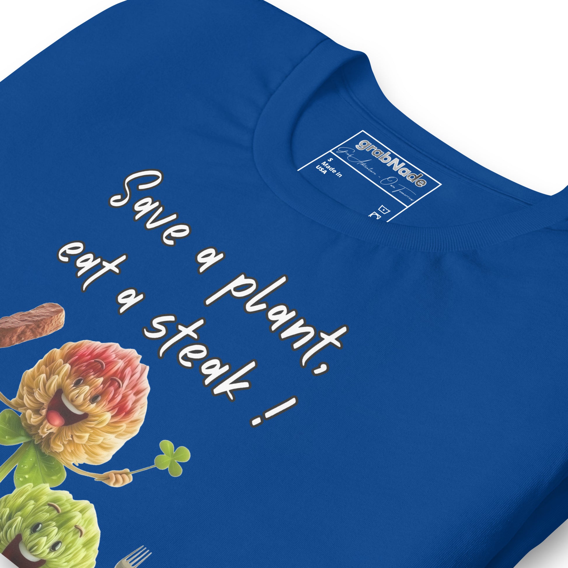 Product mockup. Blue T-shirt, zoomed in, showing grinning flower characters and “Save a plant, eat a steak!” text.