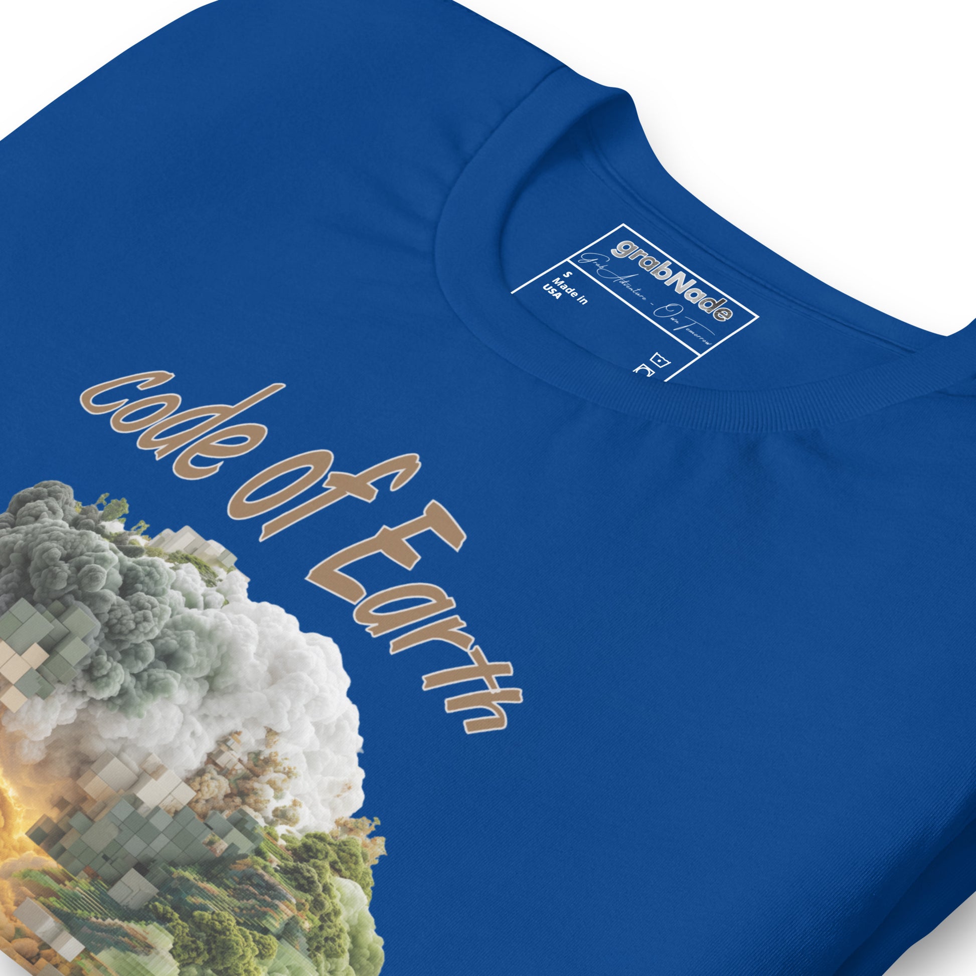 Product mockup. Blue T-shirt, zoomed in, reading “code of Earth” above pixelated cloud, fire, and forest artwork.