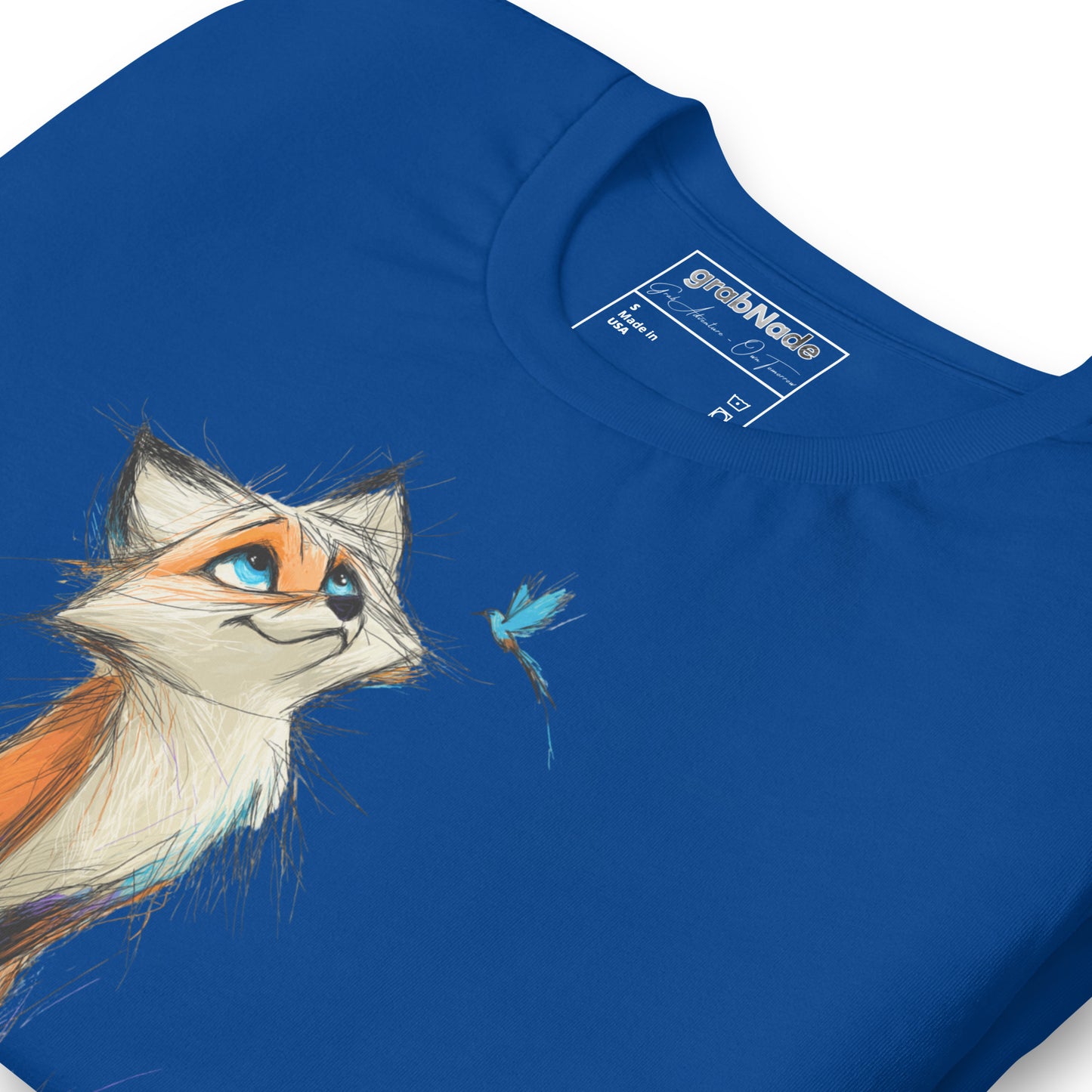 Product mockup. Blue T-shirt, zoomed in, sketch-style orange fox with blue eyes looking up at a delicate blue bird.