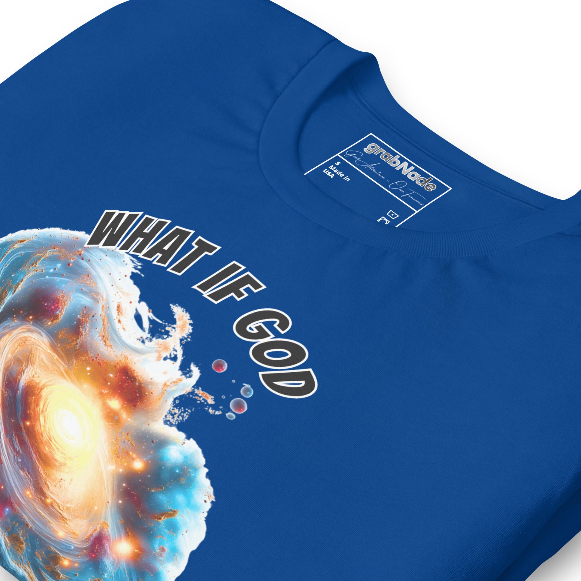 Product mockup. Blue T-shirt, zoomed in, swirling space scene with nebula and galaxies, bold white text: "WHAT IF GOD".
