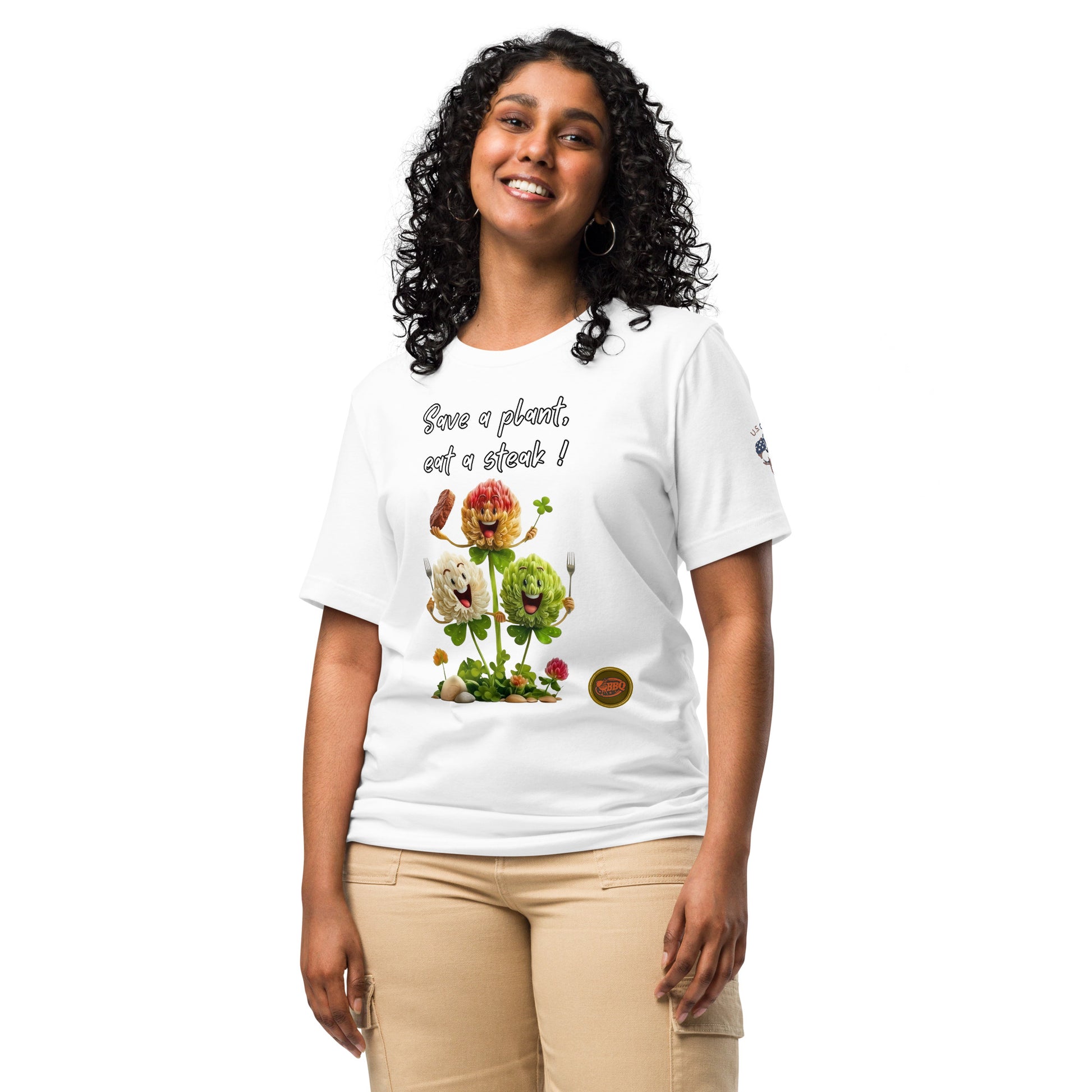 Product mockup. Smiling woman in white T-shirt featuring cartoon flowers and steak, slogan: “Save a plant, eat a steak!”