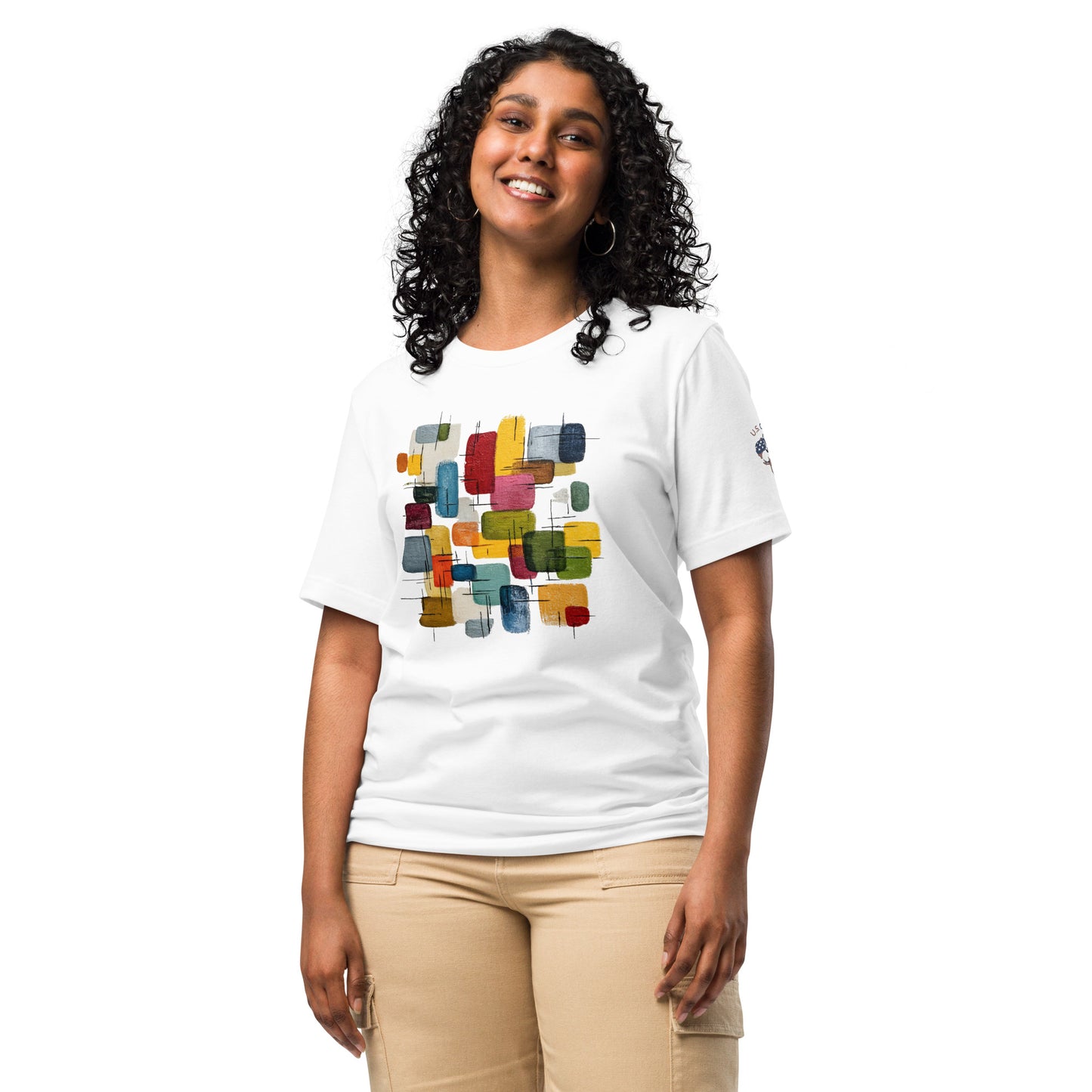Product mockup. Woman standing in white T-shirt with colorful abstract rectangles and lines on the front.