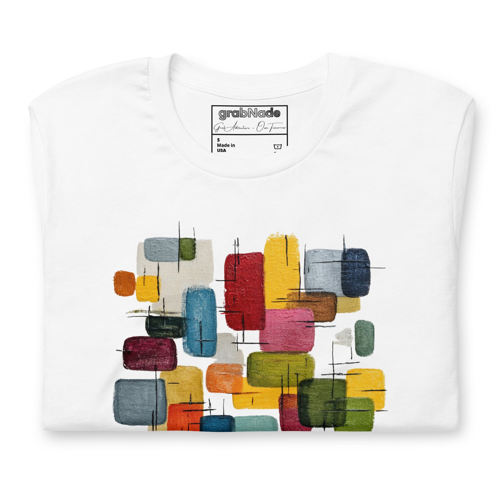 Product mockup. Folded white T-shirt, showing abstract pattern of colorful rectangles with thin black lines.