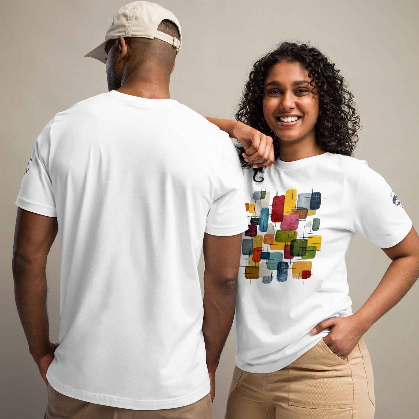 Product mockup. Man showing back of plain white T-shirt; woman in white T-shirt with colorful, abstract rectangles design.