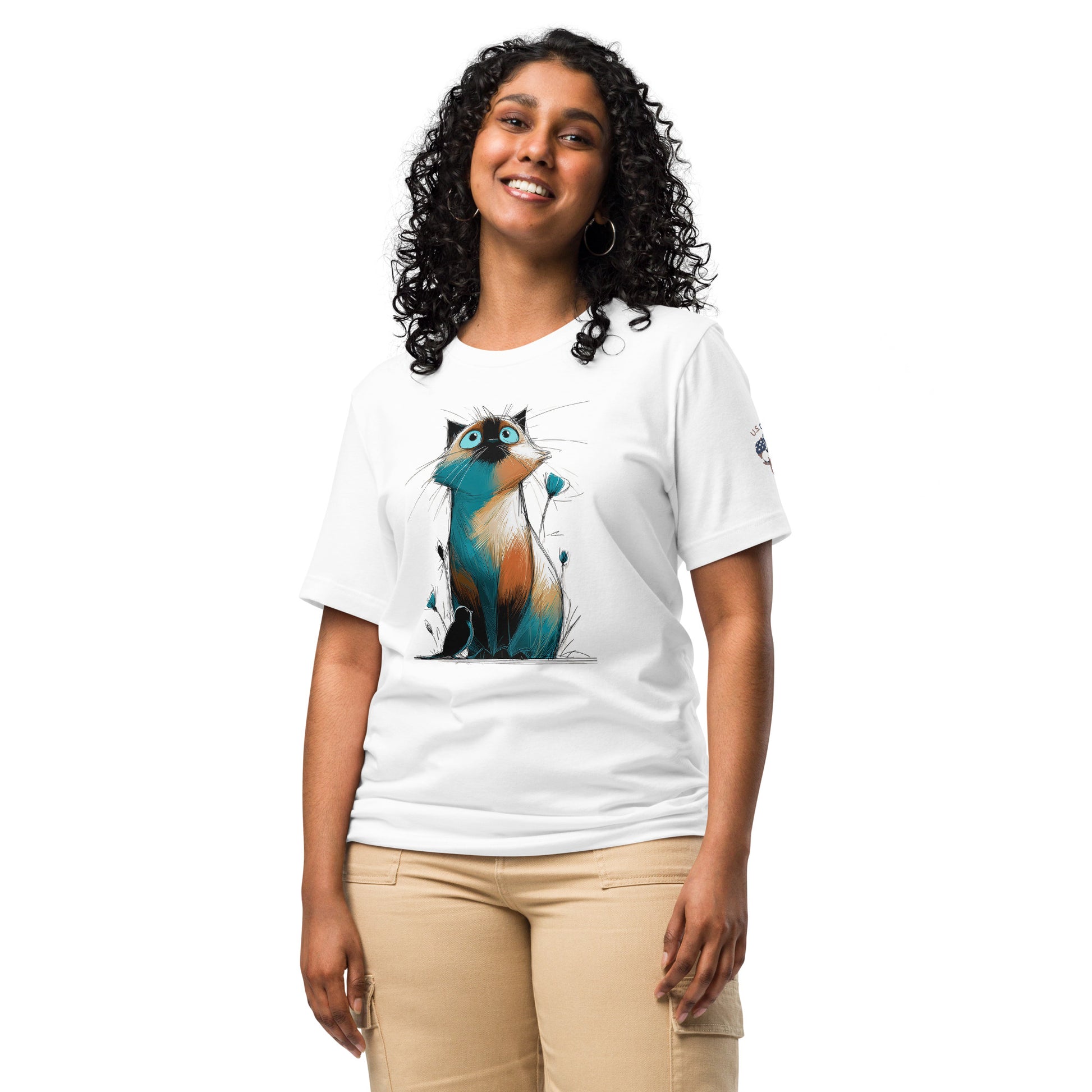 Product mockup. Woman in white T-shirt with bold, artistic cat illustration featuring blue, orange, and white hues.