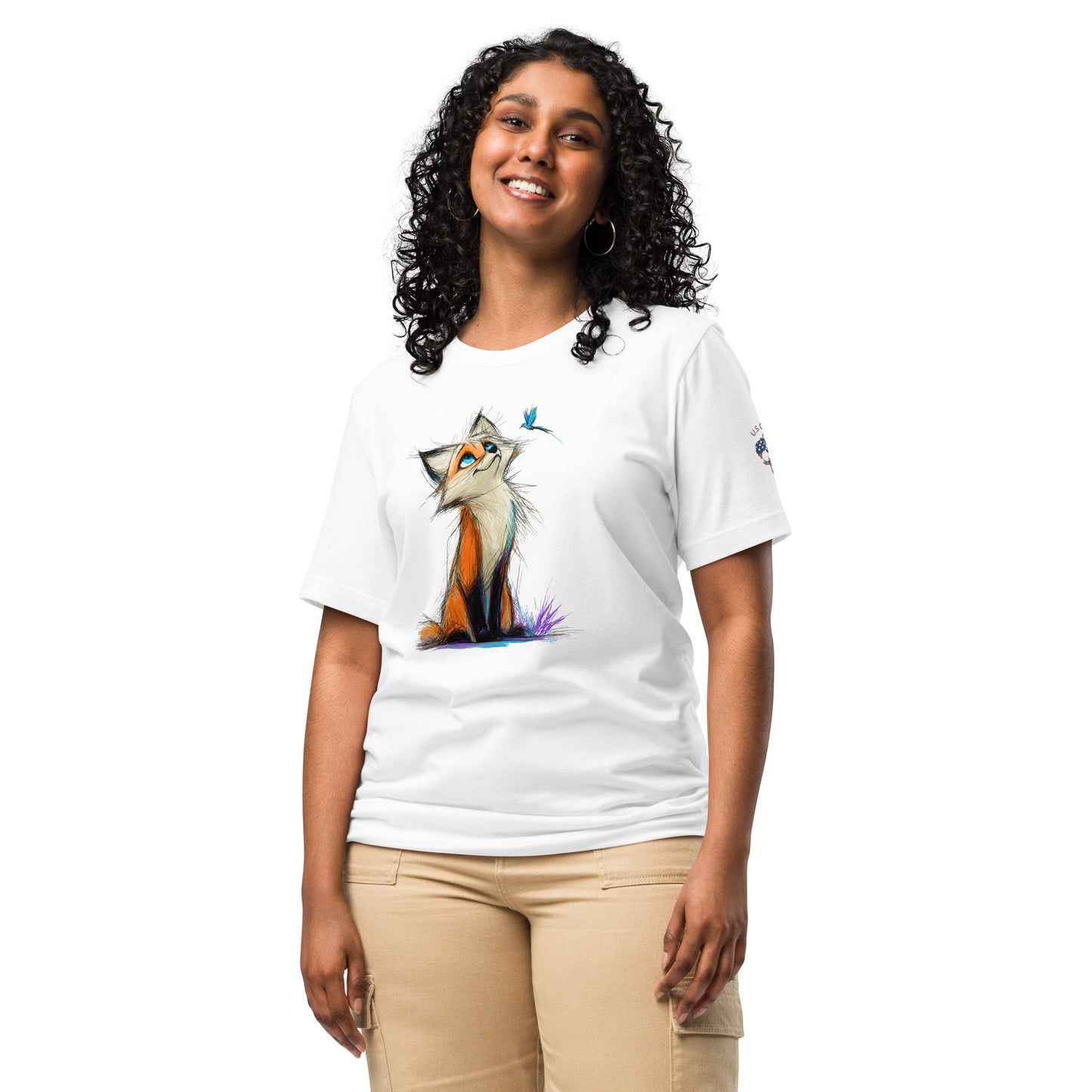 Product mockup. Woman in white T-shirt with stylized orange and white fox illustration and a blue bird nearby.
