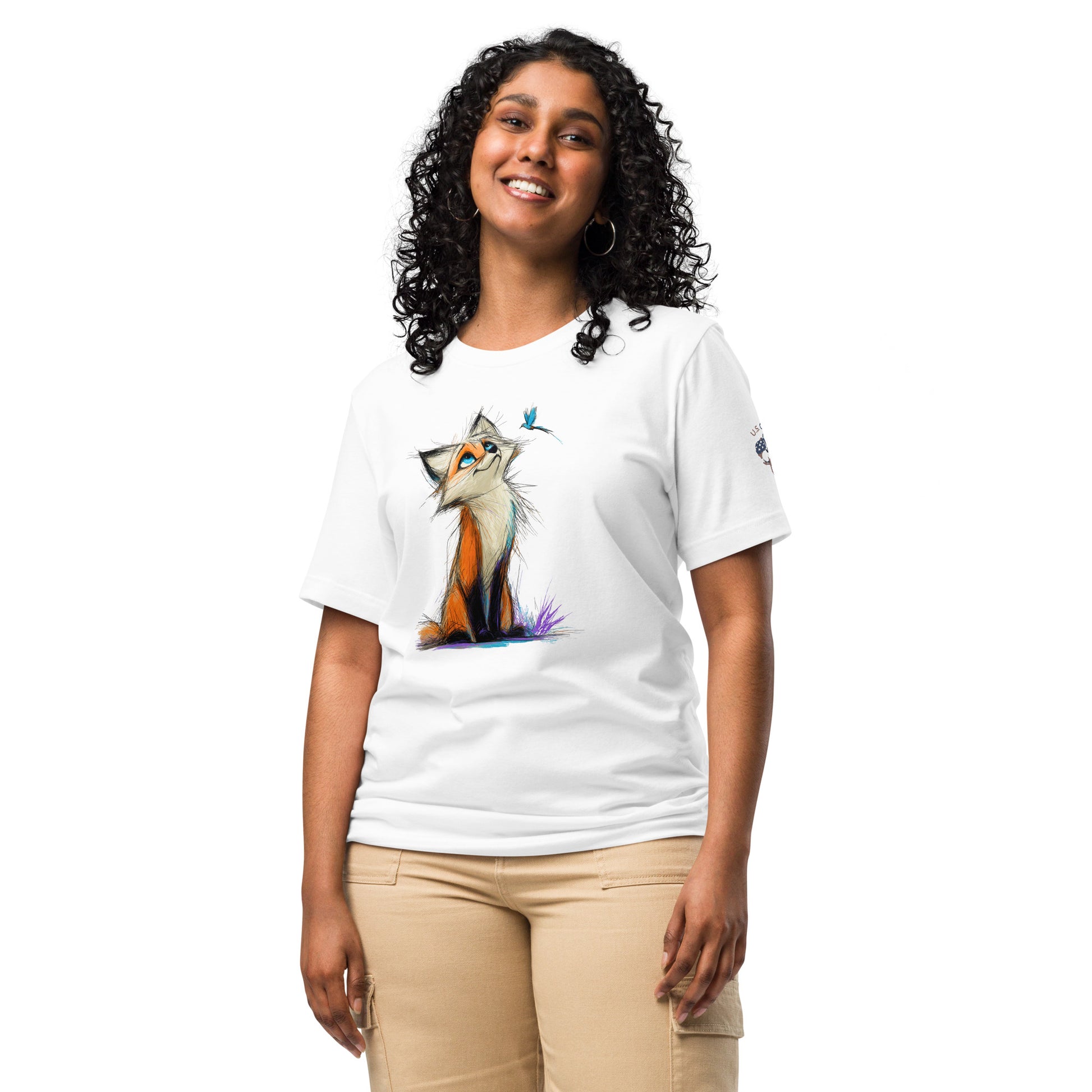 Product mockup. Woman in white T-shirt with stylized orange and white fox illustration and a blue bird nearby.