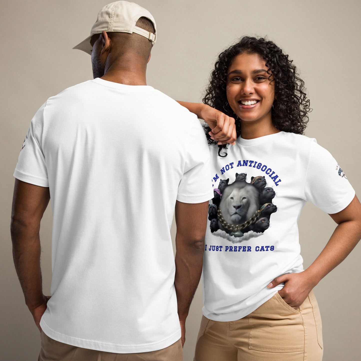 Product mockup. Woman modeling white T-shirt with large white lion surrounded by black cats, featuring blue text: "I’m not antisocial, I just prefer cats".