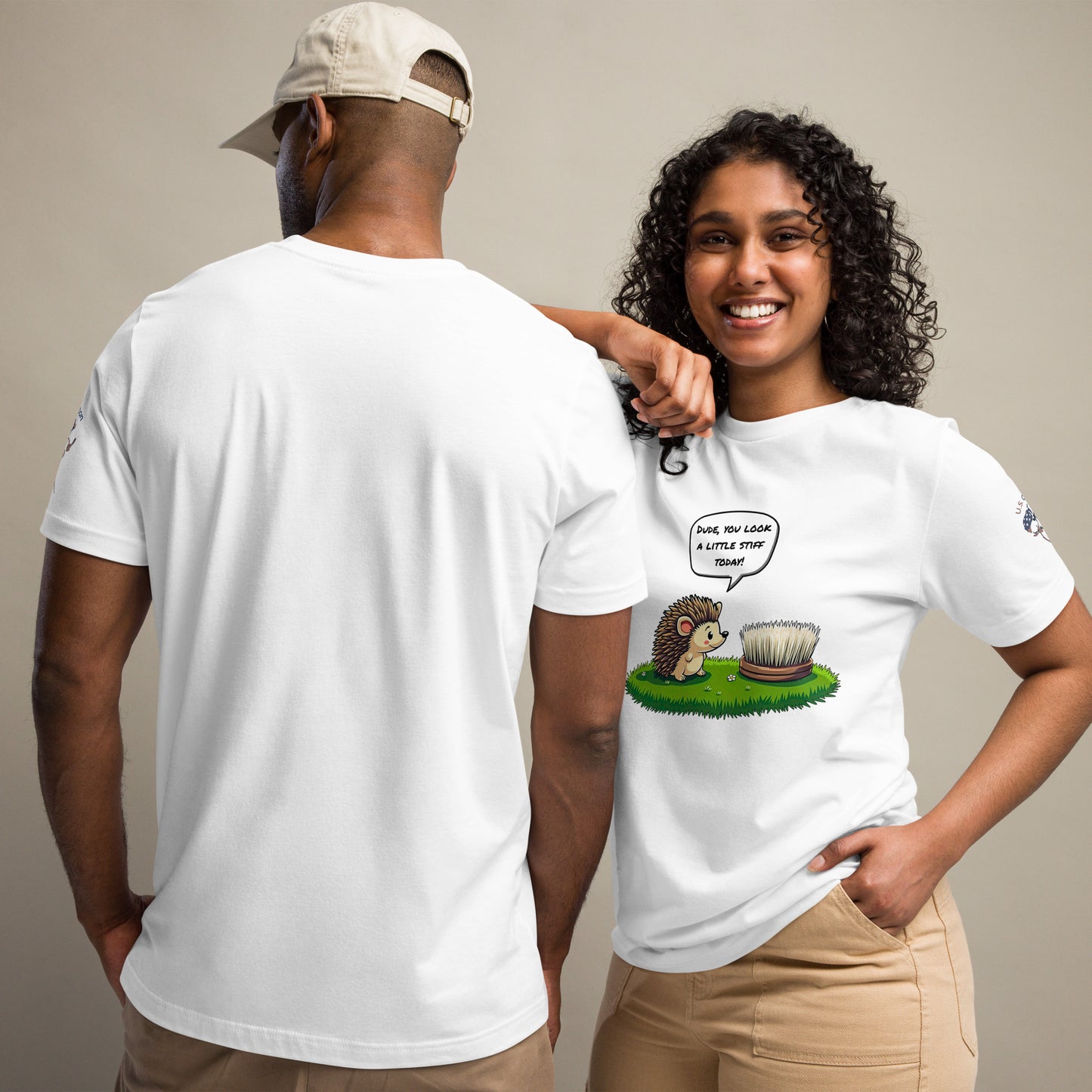Product mockup. Man showing back of plain white T-shirt; woman in T-shirt featuring a hedgehog looking at a hairbrush with a speech bubble: "Dude, you look a little stiff today!"