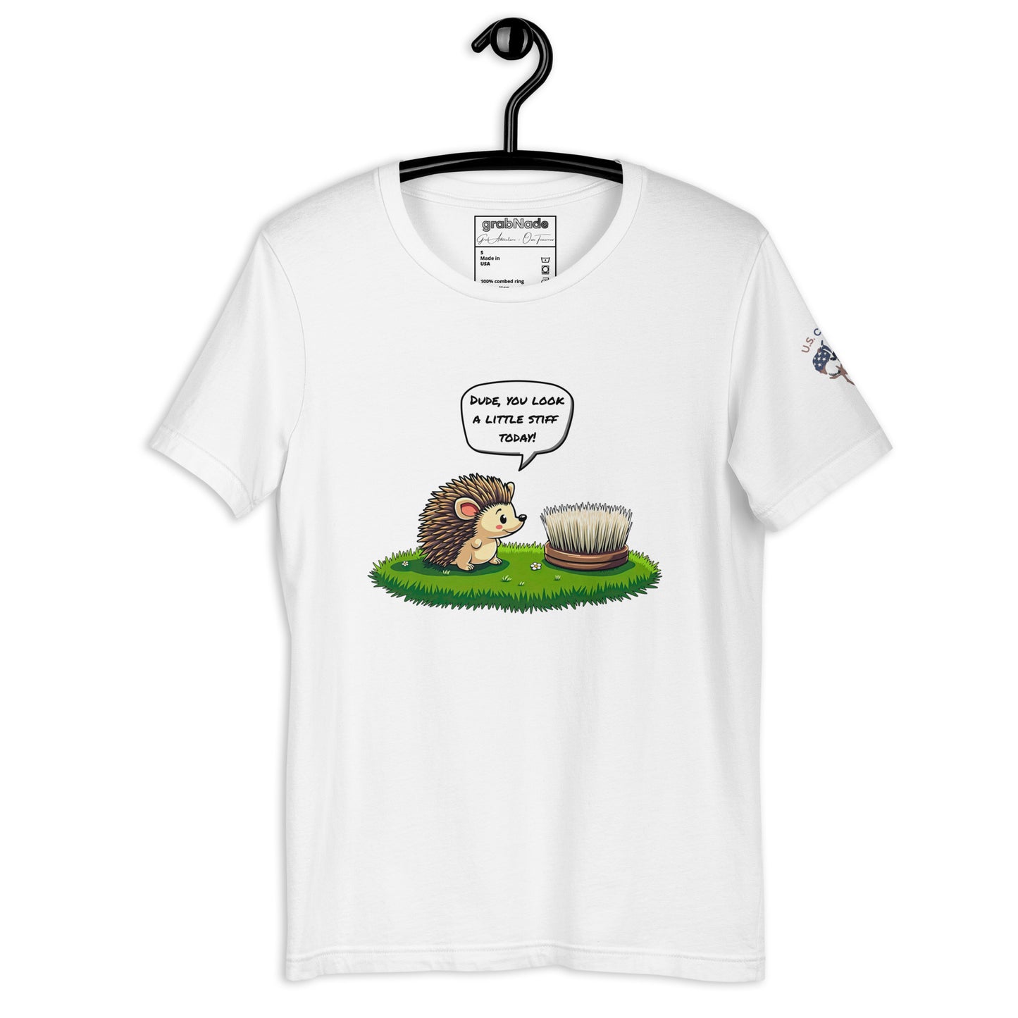 Product mockup. White T-shirt on hanger, cartoon hedgehog and brush, speech bubble: "DUDE, YOU LOOK A LITTLE STIFF TODAY!"