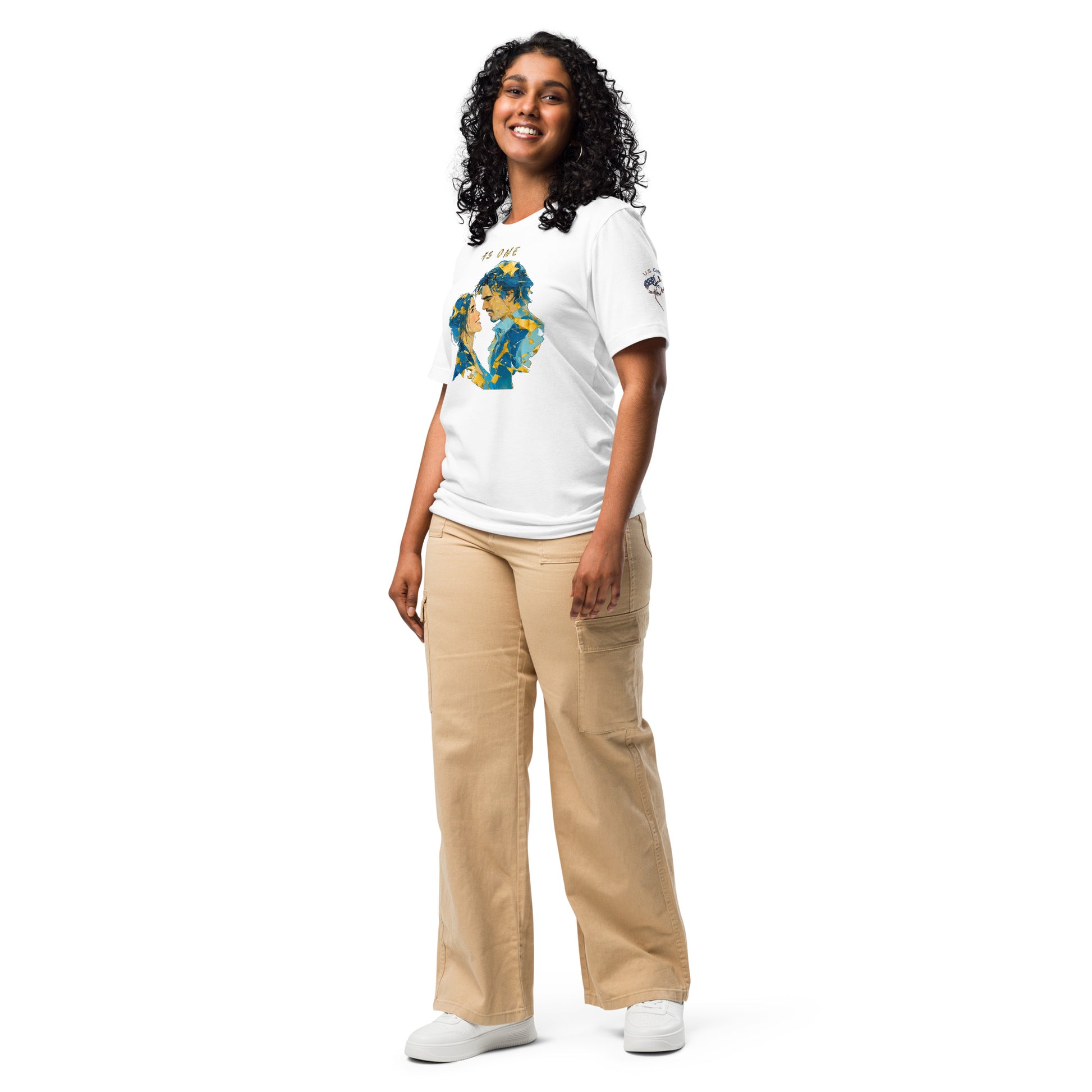 Product mockup. Woman in white T-shirt, full body, showing blue-gold abstract art of two people hugging, "AS ONE" text, sleeve logo visible.