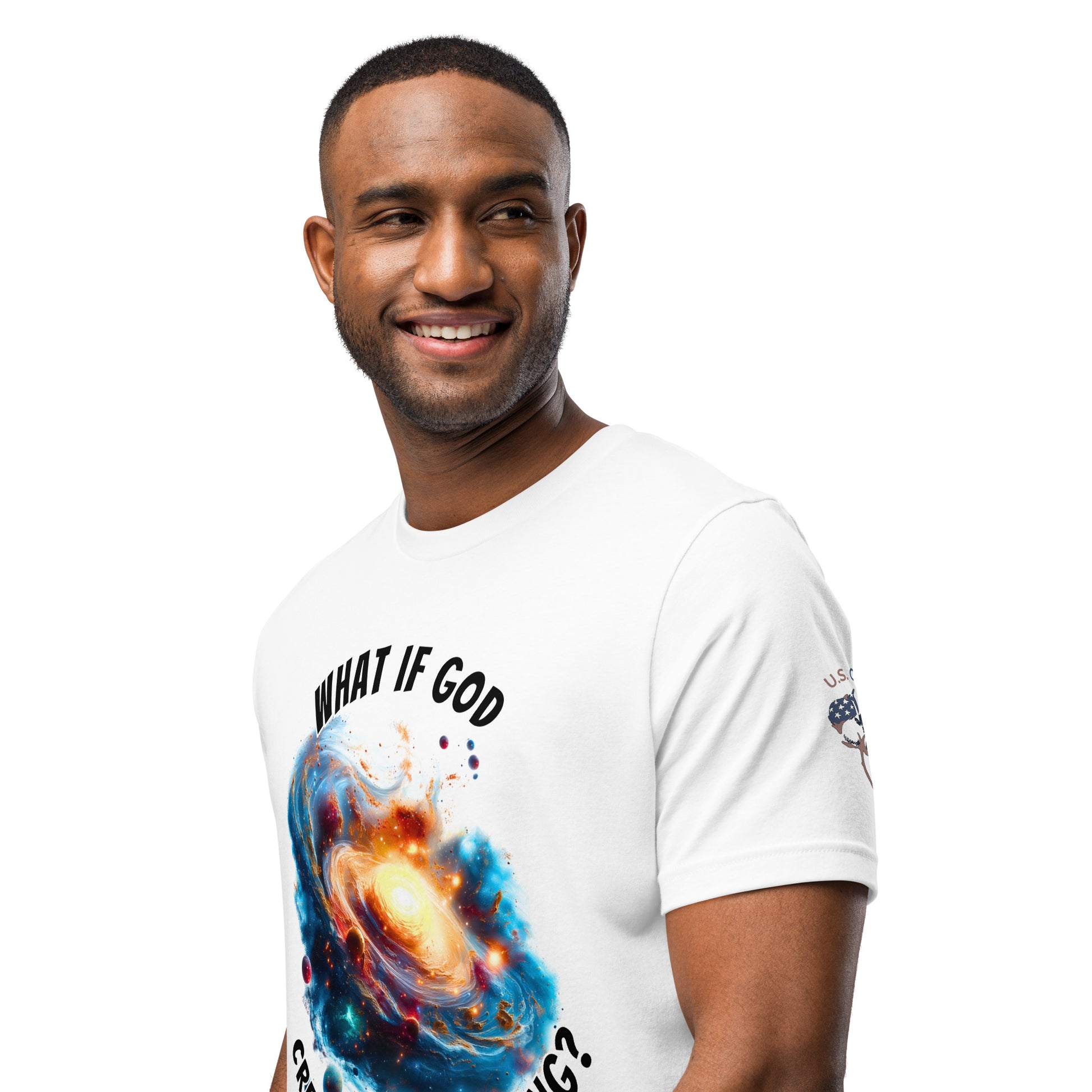 Product mockup. Man in white T-shirt with a swirling galaxy graphic and "WHAT IF GOD CREATED THE BIG BANG?", close-up from the torso up.