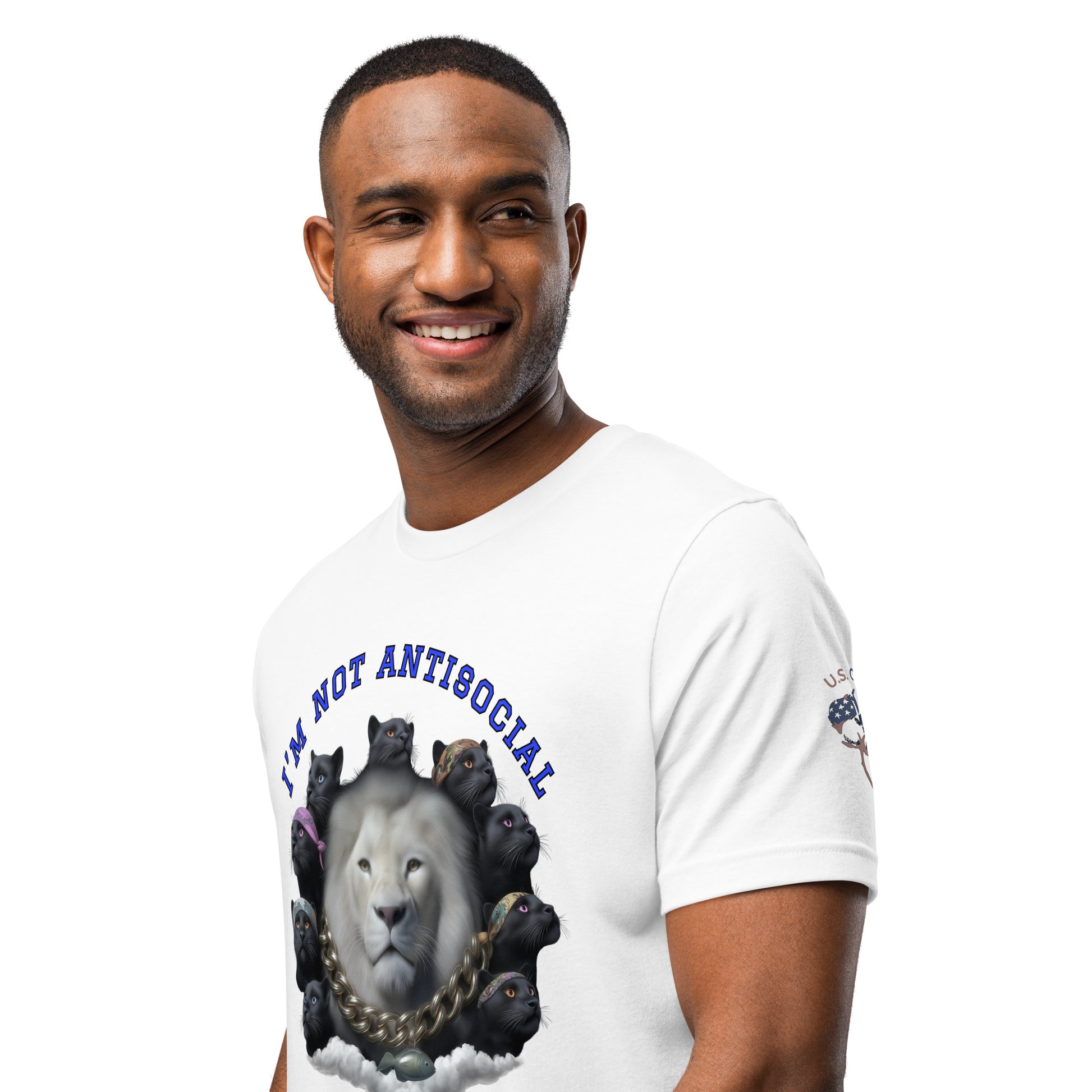 Product mockup. Man wearing a white t-shirt featuring the text "I'M NOT ANTISOCIAL" above a design of several black cats arranged in a circle around a lion, close-up from the torso up.