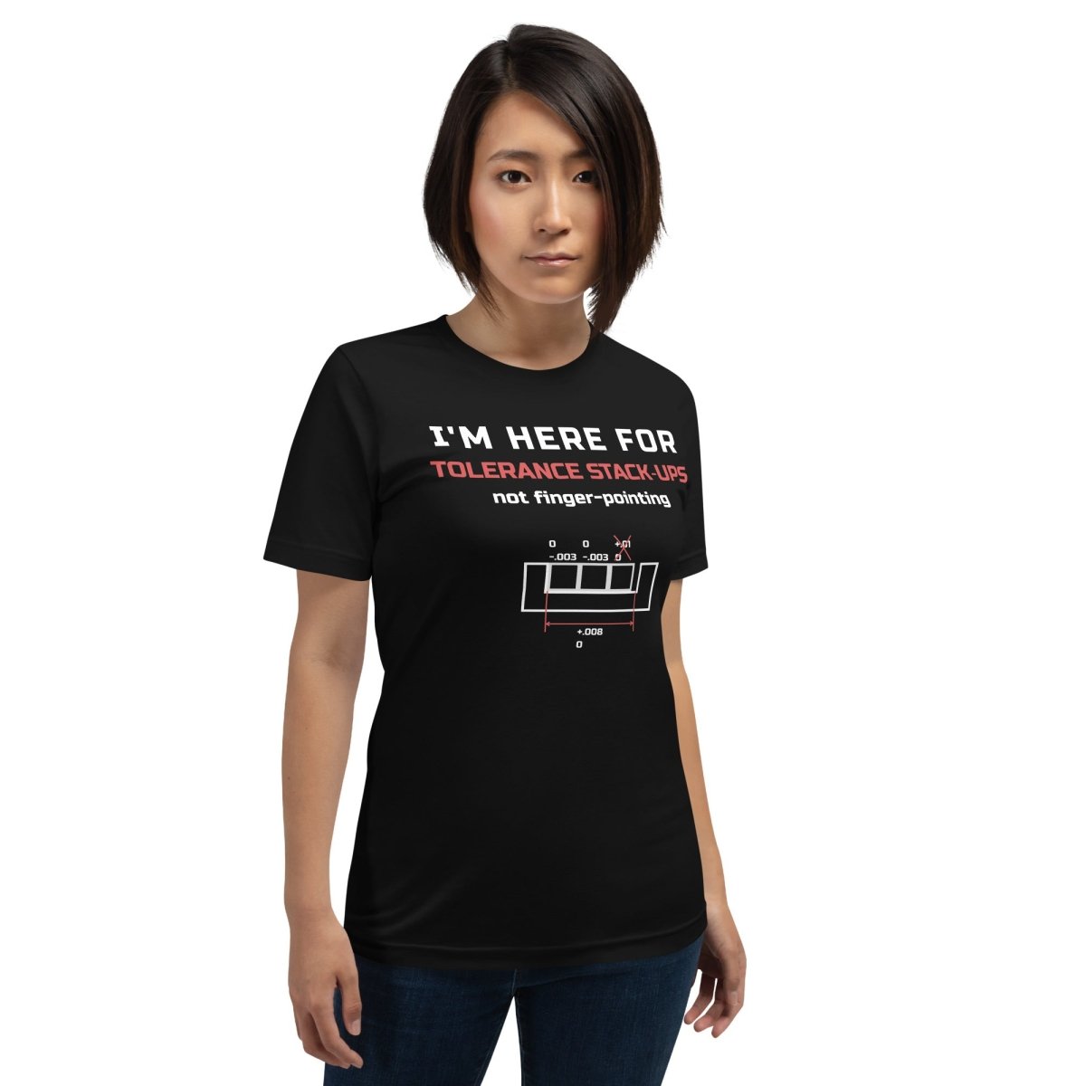 Woman in black premium t-shirt featuring tolerance stack-ups with orange and white typography. For manufacturing and mechanical engineers