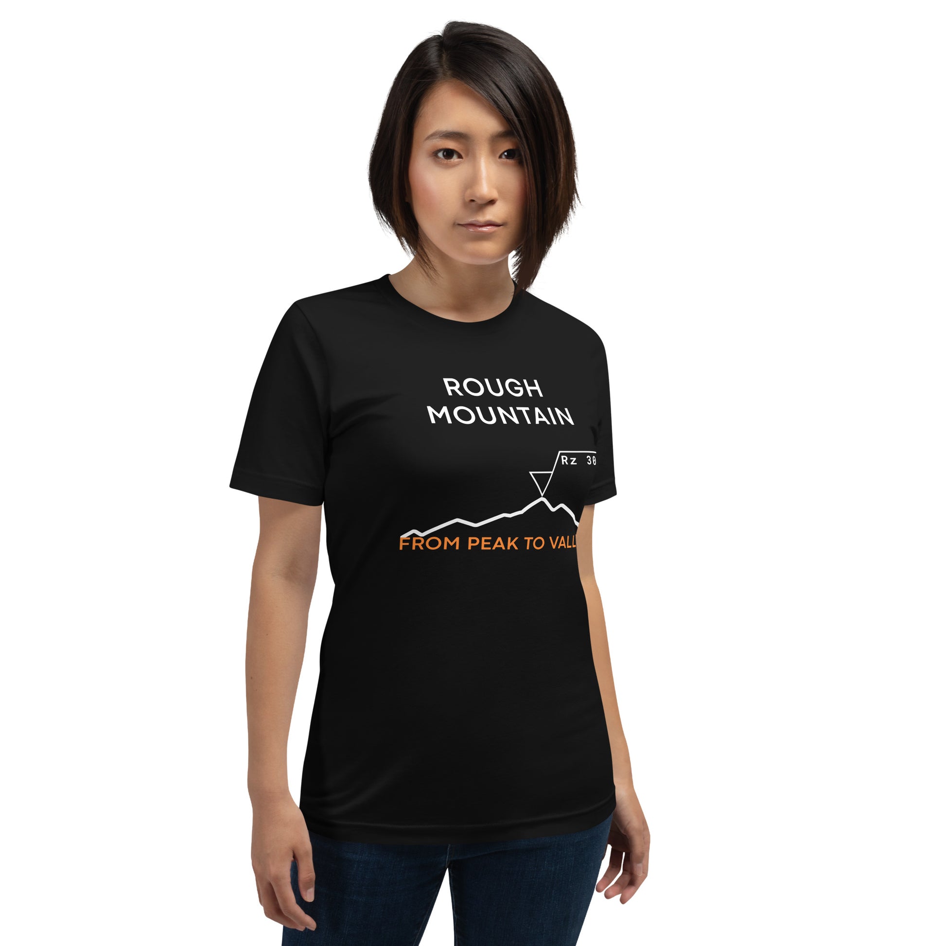 Woman in black tee featuring an Rz 300 surface profile mountain graphic and "Peak to Valley" text.
