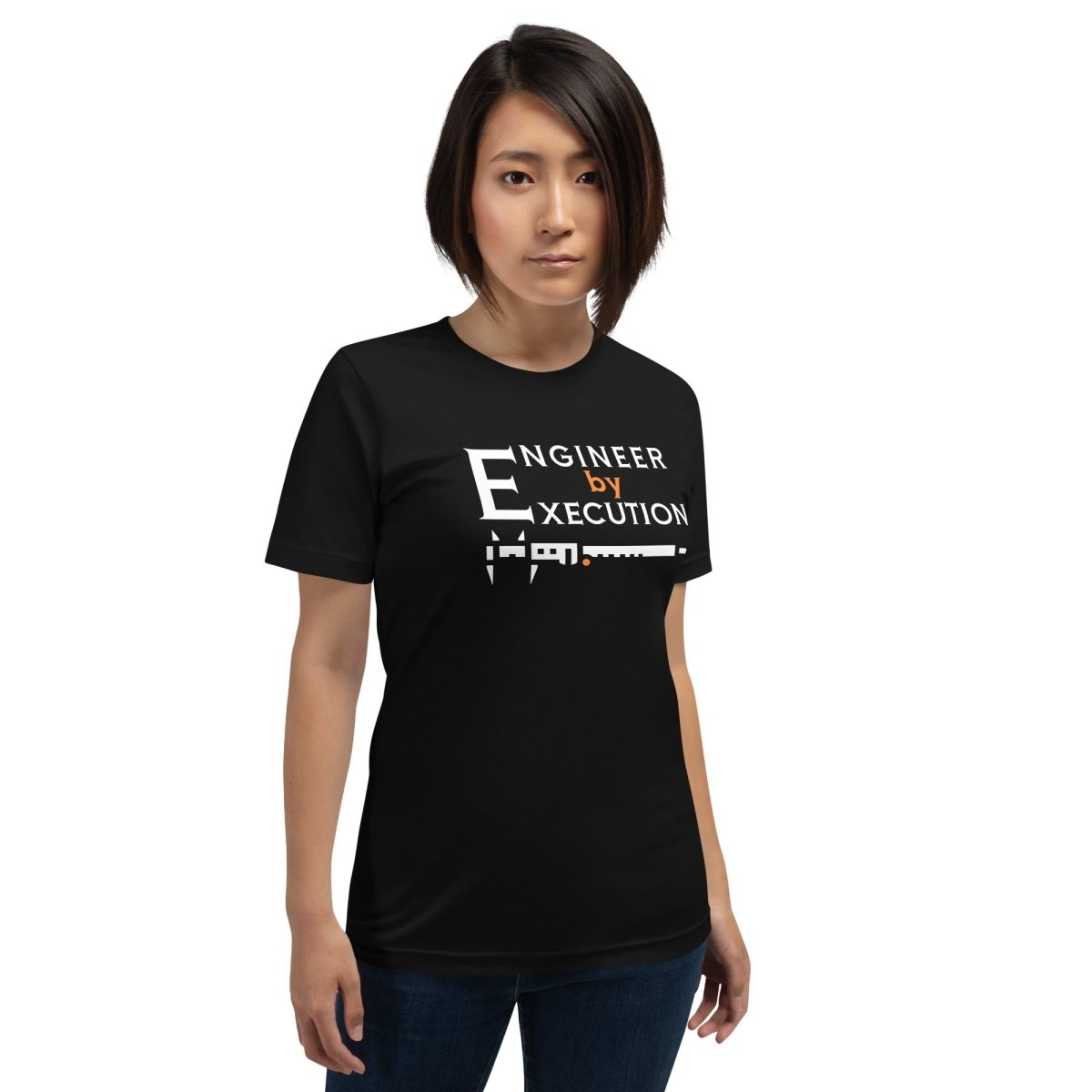 Woman in black premium Combed ring-spun cotton tee with “Engineer by Execution” text with a caliper.