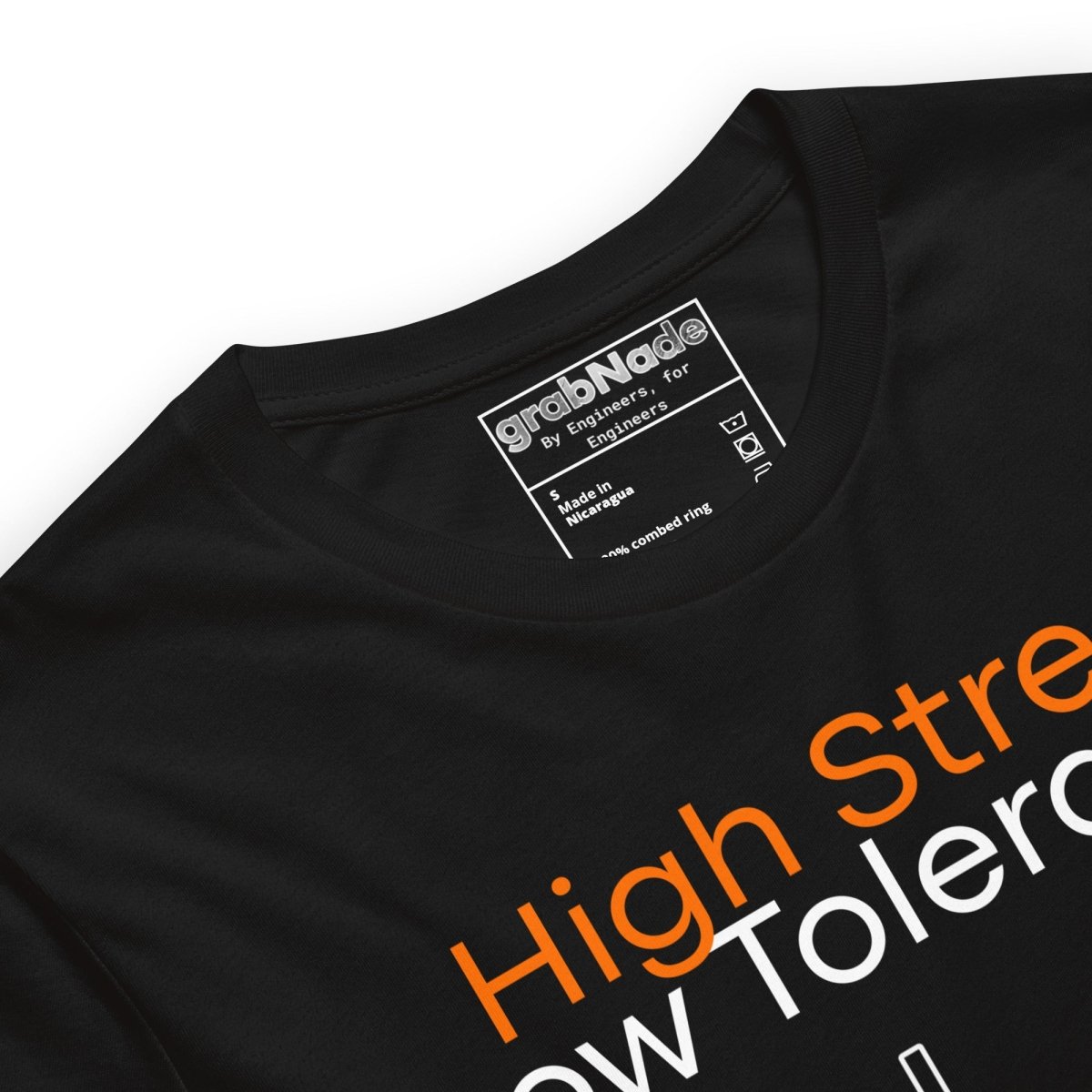 Close up of black t-shirt. High Stress Low Tolerance injection molding machine with 120 tons, ±0.00025", 235°C.