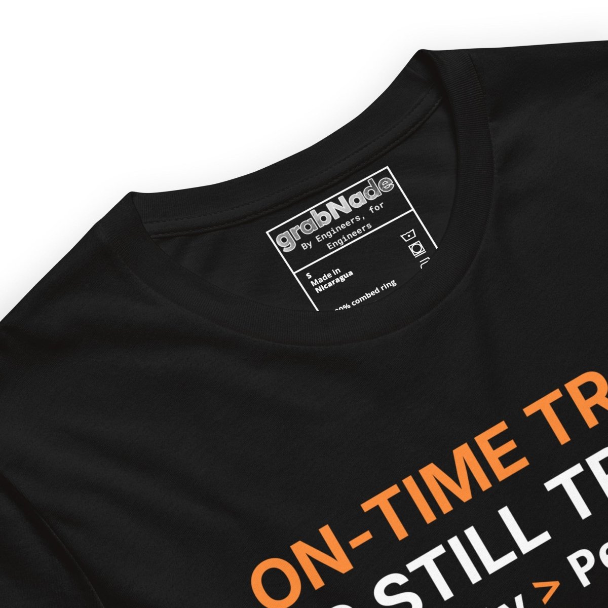 Close up of black tee featuring "ON-TIME Trash is still Trash" for manufacturing and quality engineers.