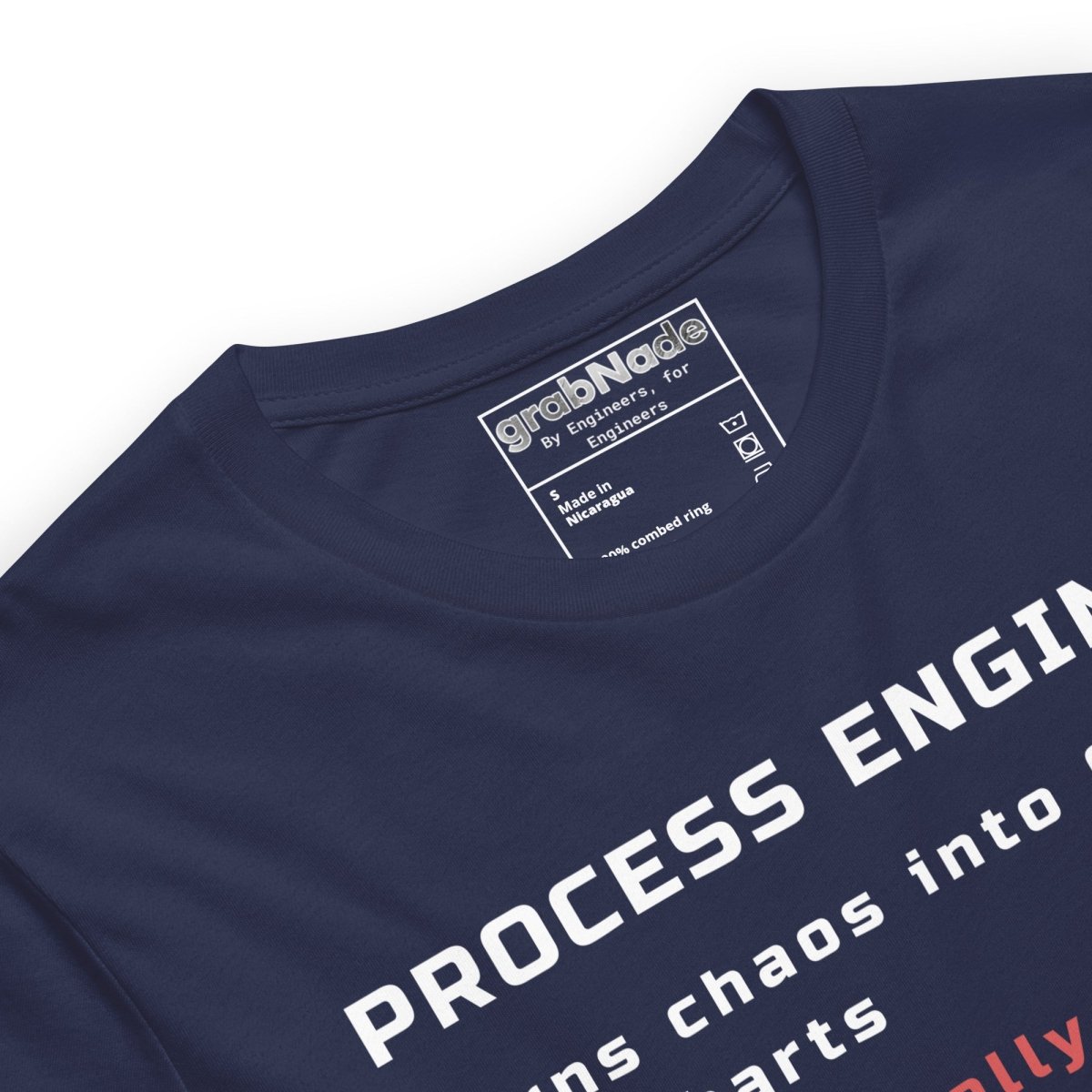 Close up of navy t-shirt with "Process Engineer. Turns chaos into Gantt & flowcharts" definition text.