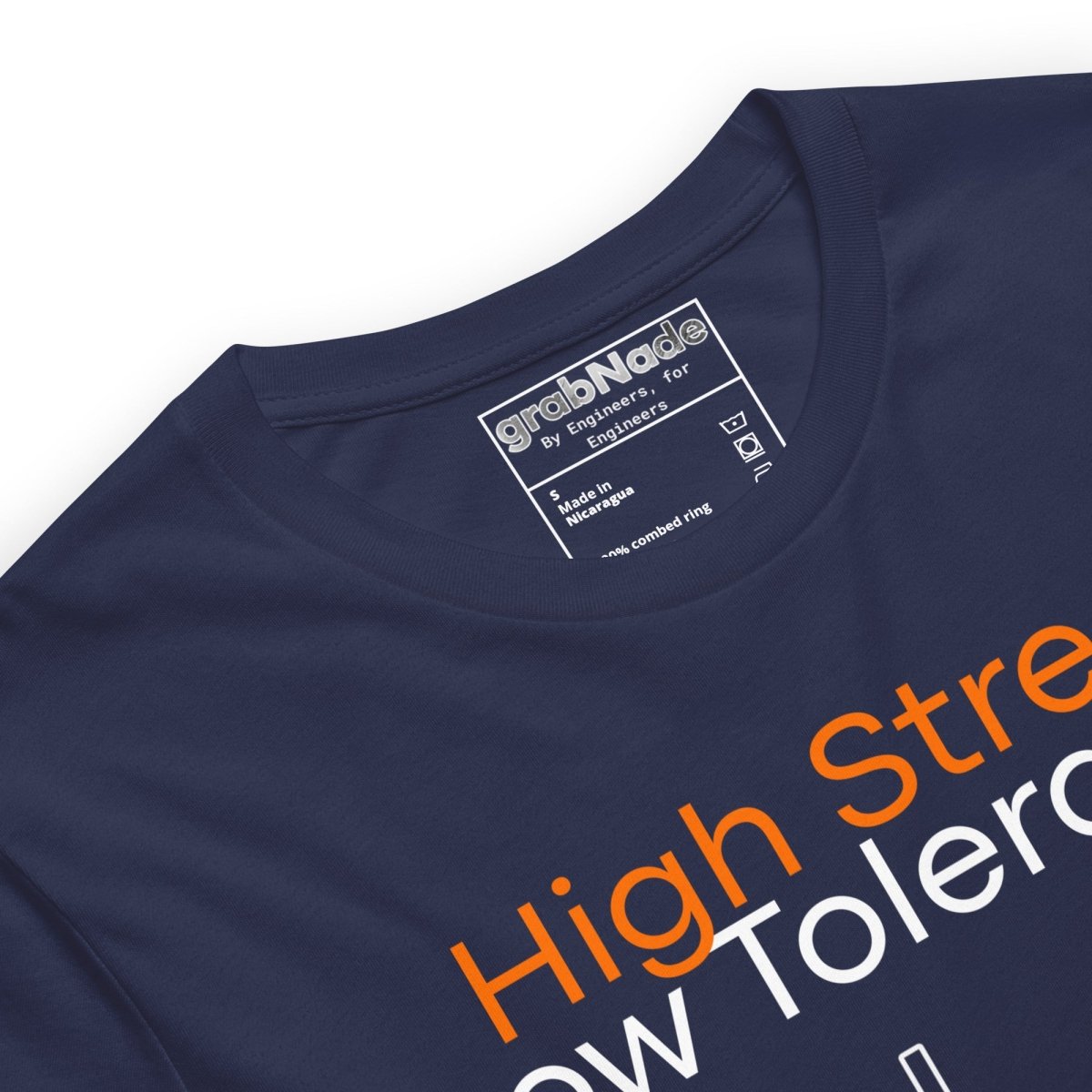 Close up of navy t-shirt. High Stress Low Tolerance injection molding machine with 120 tons, ±0.00025", 235°C.