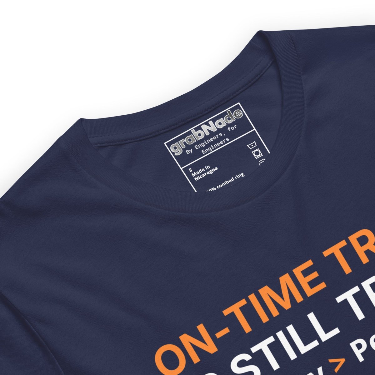 Close up of navy tee featuring "ON-TIME Trash is still Trash" for manufacturing and quality engineers.