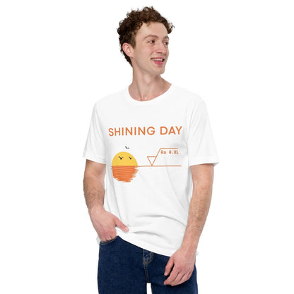 Man in white t-shirt featuring an Ra0.02 surface finish symbol on a geometric sunset horizon line.
