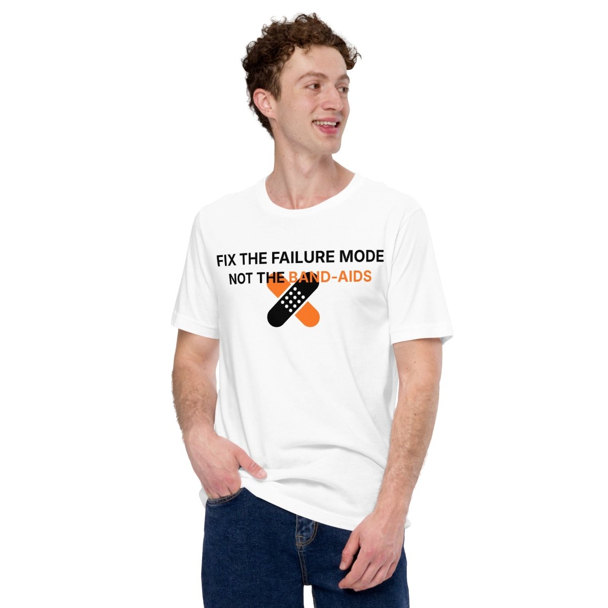 Man in white t-shirt with "Fix the failure mode. Not the band-aids" text. For engineers & tech.