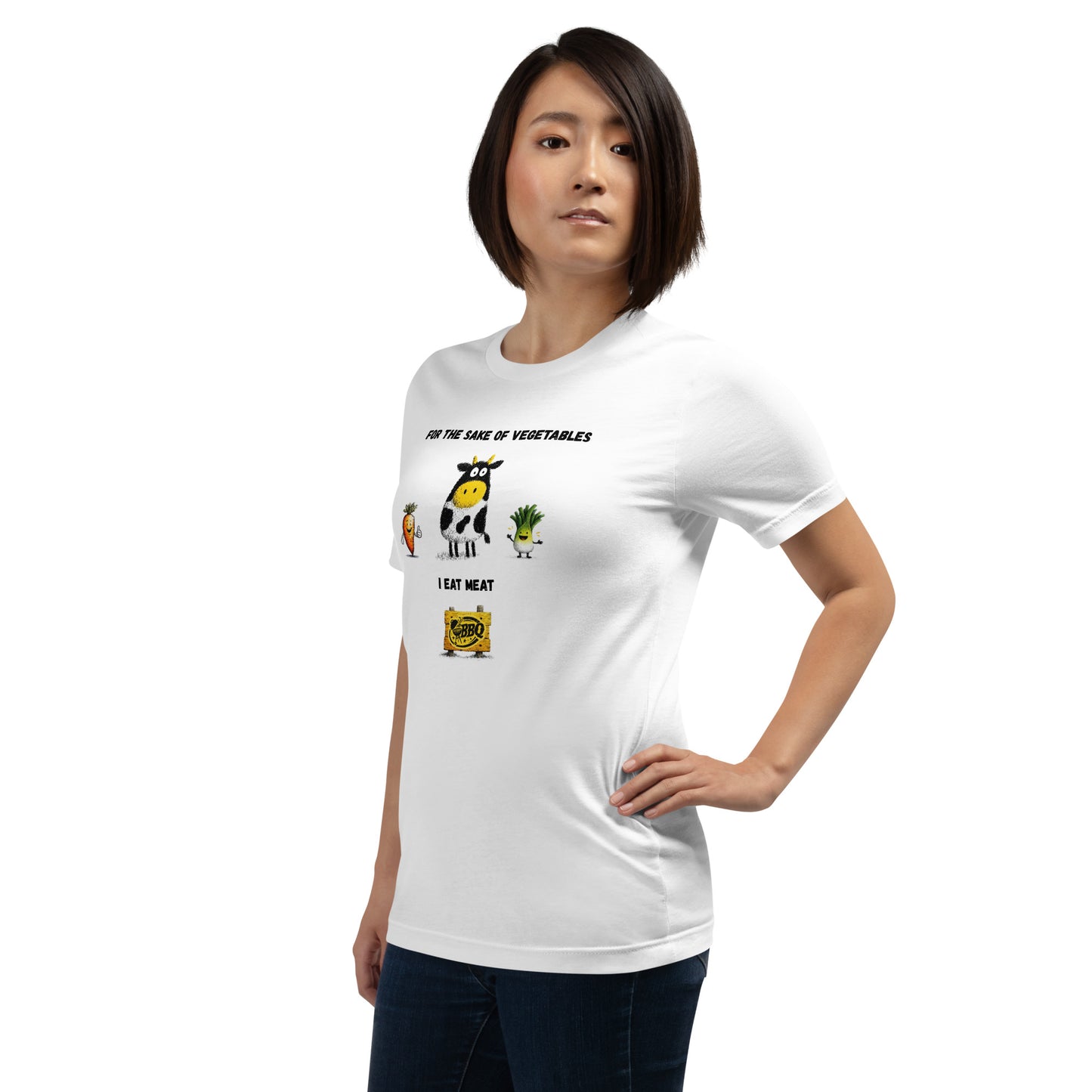 A woman with straight dark hair, hand on hip, wears a grabNade Unisex Regular Tee made from ultra-soft premium cotton. The white shirt displays “For the Sake of Vegetables, I Eat Meat” with cartoon veggies and a burger graphic.
