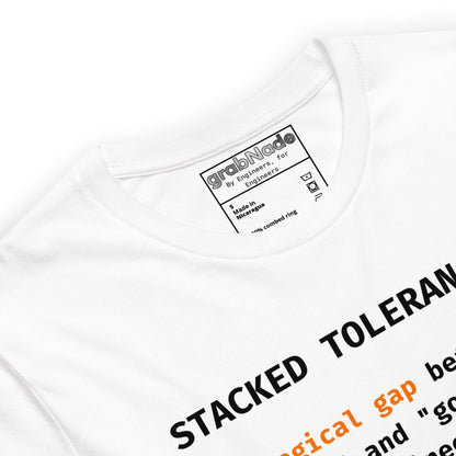 Close  up of white t-shirt with "Stacked Tolerances magical gap perfect good enough" engineering definition.