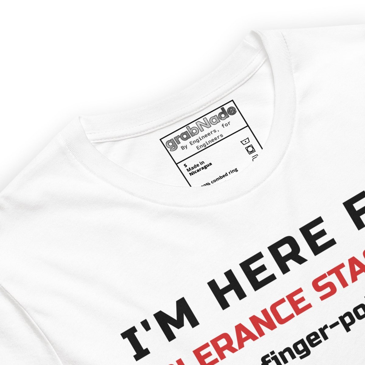 Close up of white premium t-shirt featuring tolerance stack-ups with orange and white typography. For manufacturing and mechanical engineers