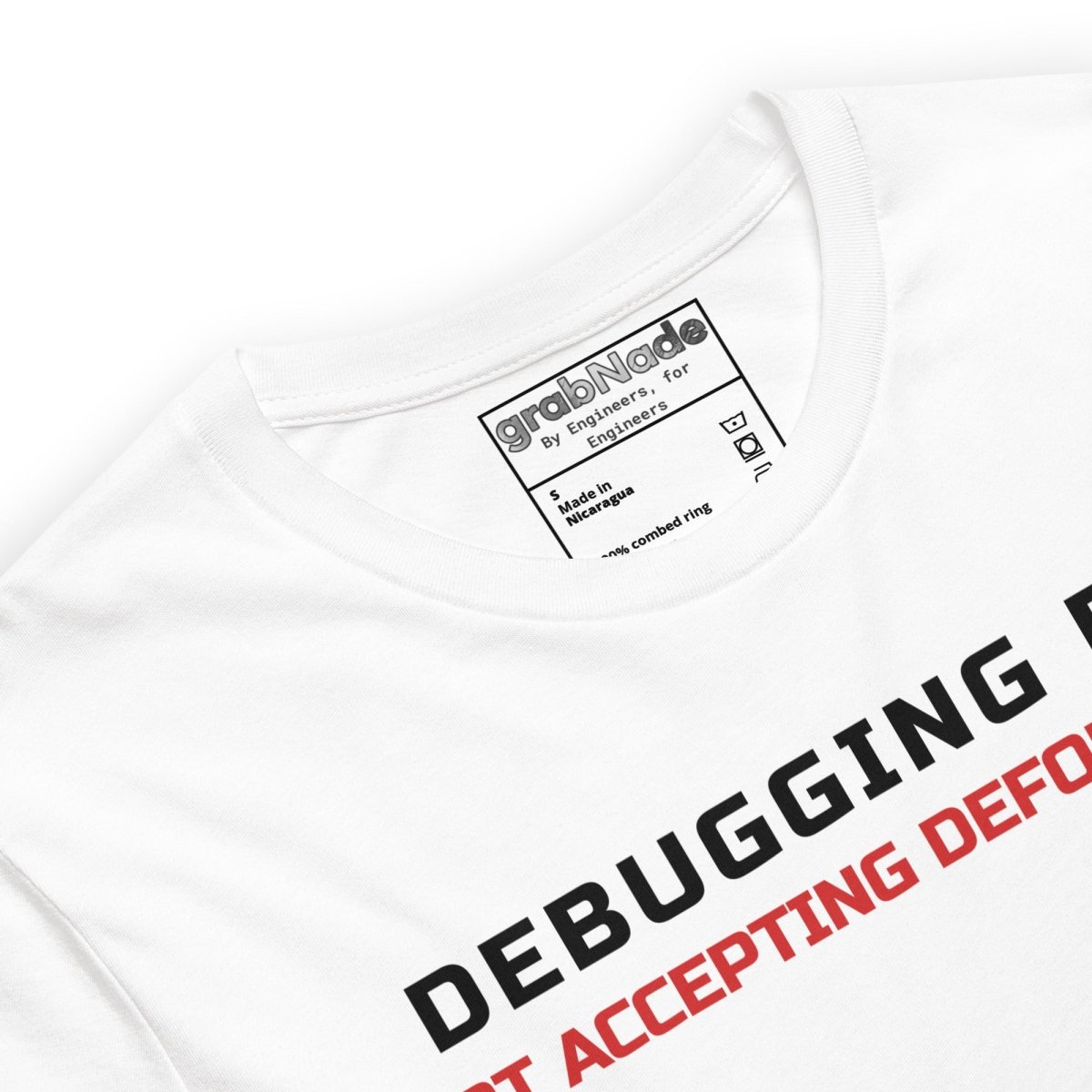 Close up of white premium t-shirt featuring the text "Debugging FEA. Not accepting deformation" designed for mechnical & aerospace engineers.