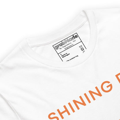 Close up of white tee featuring an Ra0.02 surface finish symbol on a geometric sunset horizon line.