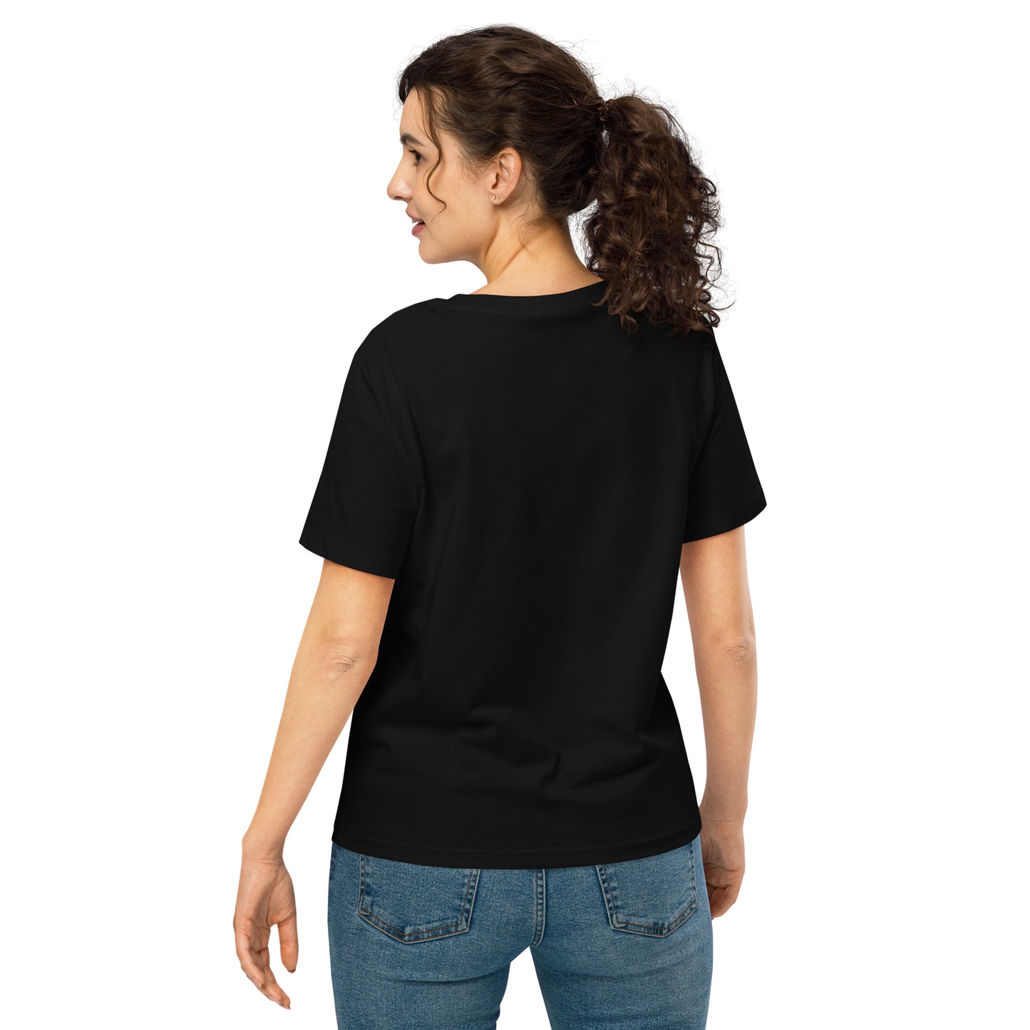 Product mockup. A woman shown from behind wearing a plain black organic cotton t-shirt with short sleeves. The shirt has a relaxed fit, and no design or graphics appear on the back. She is also wearing blue jeans pants.