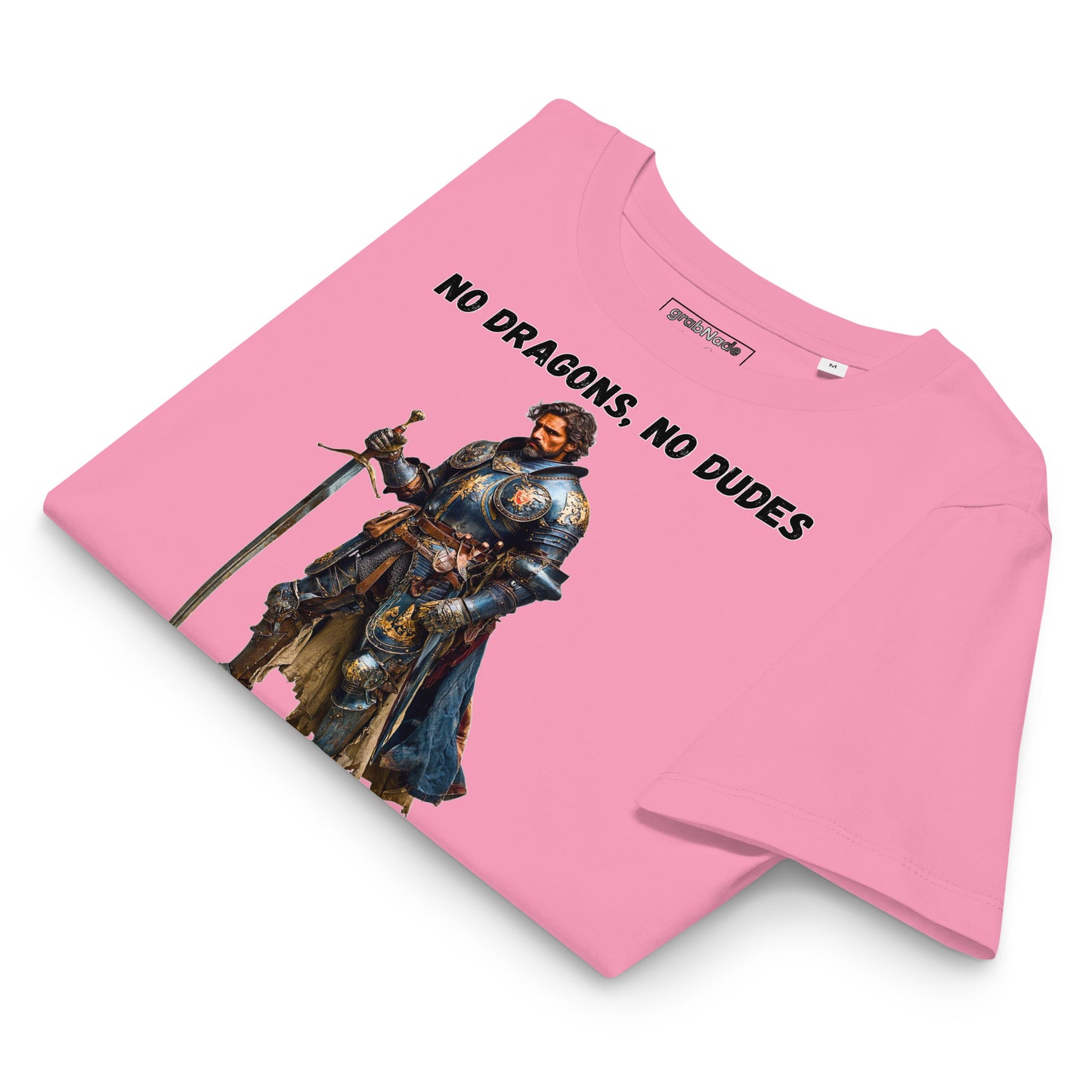 Product mockup. Folded organic premium pink t-shirt featuring warrior knight in detailed armor holding sword with bold black text above and below stating 'NO DRAGONS, NO DUDES'.