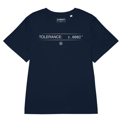 Woman in navy premium GOTS t-shirt with white text "TOLERANCE: ±.0002" and GD&T symbol for mechanical engineers.