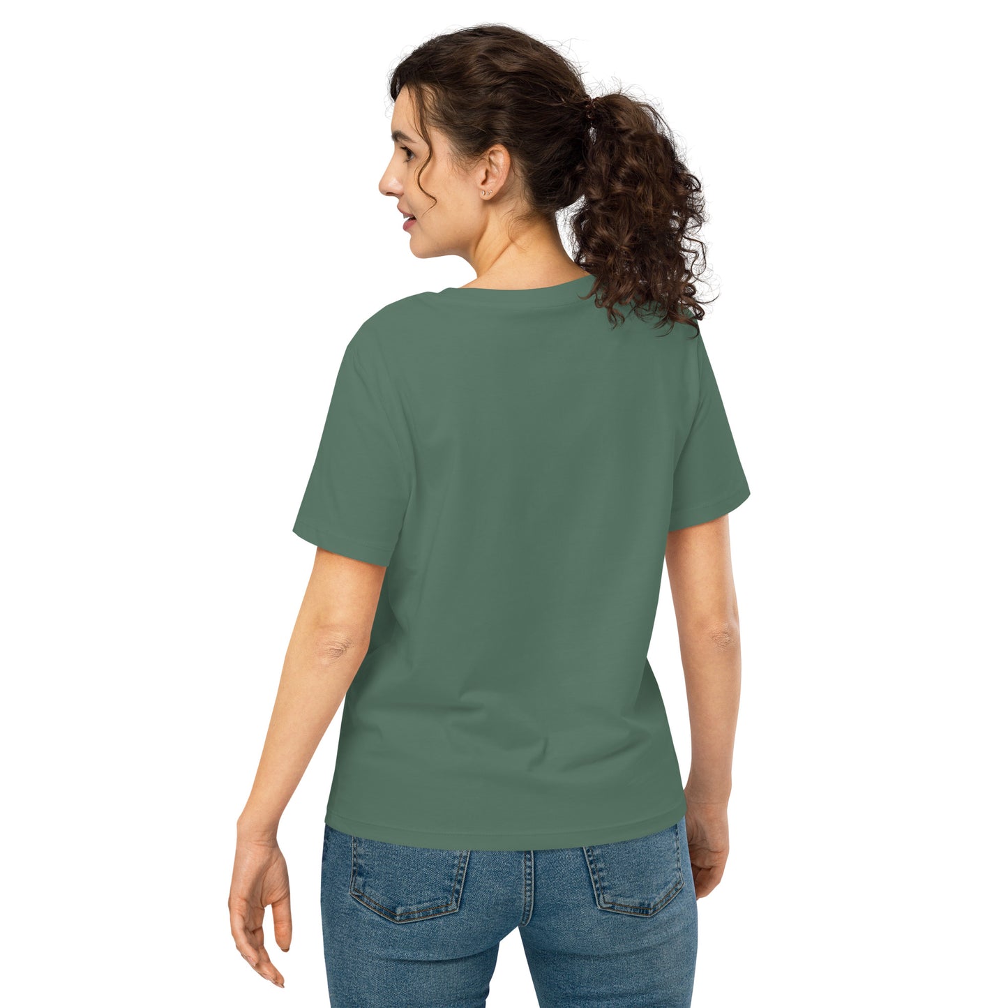 Product mockup. A woman shown from behind wearing a plain green organic cotton t-shirt with short sleeves. The shirt has a relaxed fit, and no design or graphics appear on the back. She is also wearing blue jeans pants.