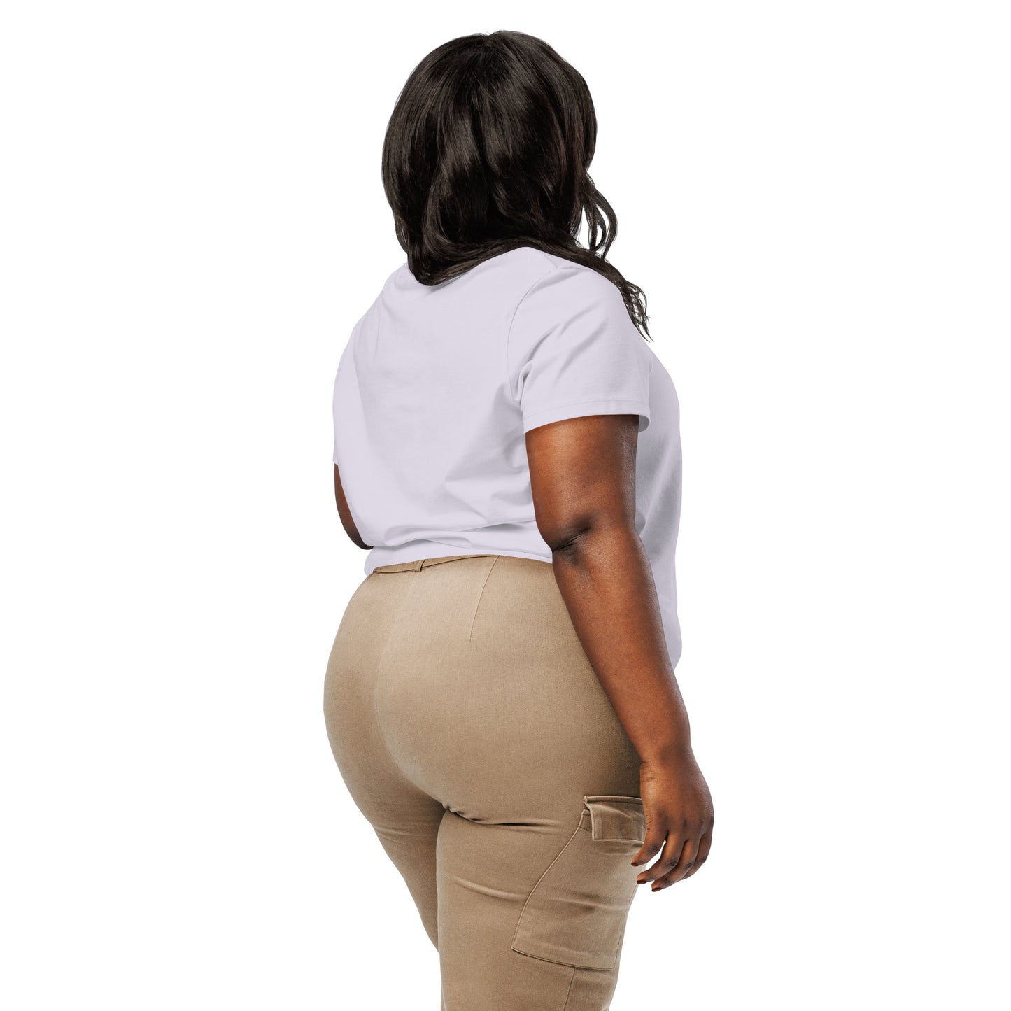 Product mockup. A woman shown from behind wearing a plain lavender organic cotton t-shirt with short sleeves. The shirt has a relaxed fit, and no design or graphics appear on the back. She is also wearing khaki pants with side pockets.