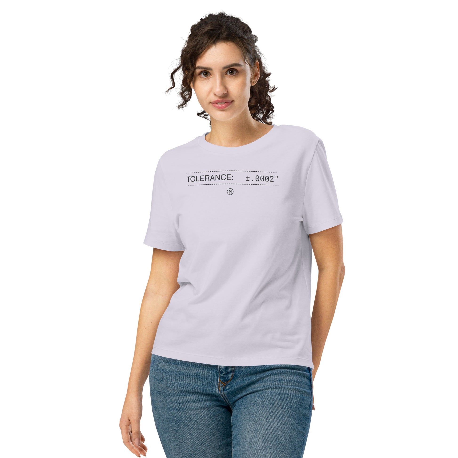 Woman in organic lavender premium t-shirt with text "TOLERANCE: ±.0002" for mechanical engineers.
