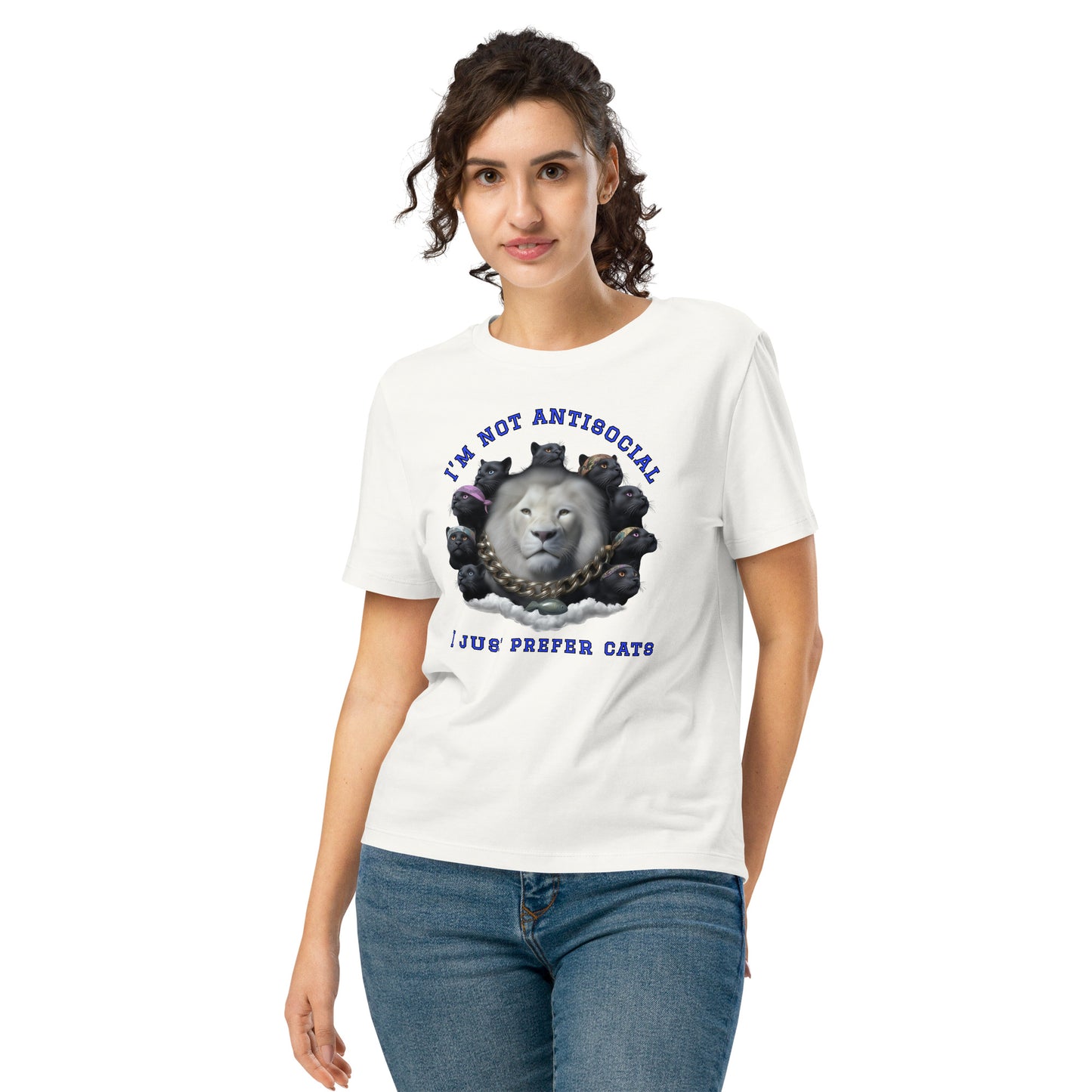 Product mockup. A woman wearing a off white organic cotton t-shirt featuring a bold graphic on the front: a large white lion's head surrounded by black panthers wearing colorful bandanas, arranged in a circle. Above the graphic is the phrase 'I'M NOT ANTISOCIAL' and below it reads 'I JUST PREFER CATS' in blue capital letters.