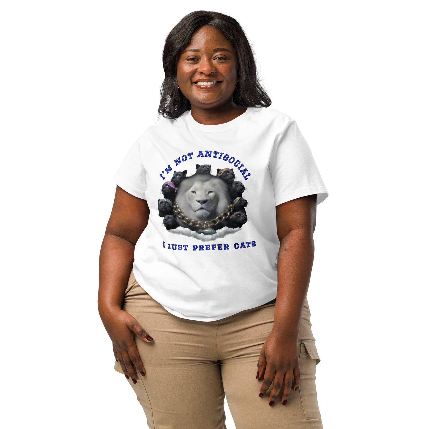 Product mockup. A woman wearing a 2XL white organic cotton t-shirt featuring a bold graphic on the front: a large white lion's head surrounded by black panthers wearing colorful bandanas, arranged in a circle. Above the graphic is the phrase 'I'M NOT ANTISOCIAL' and below it reads 'I JUST PREFER CATS' in blue capital letters.
