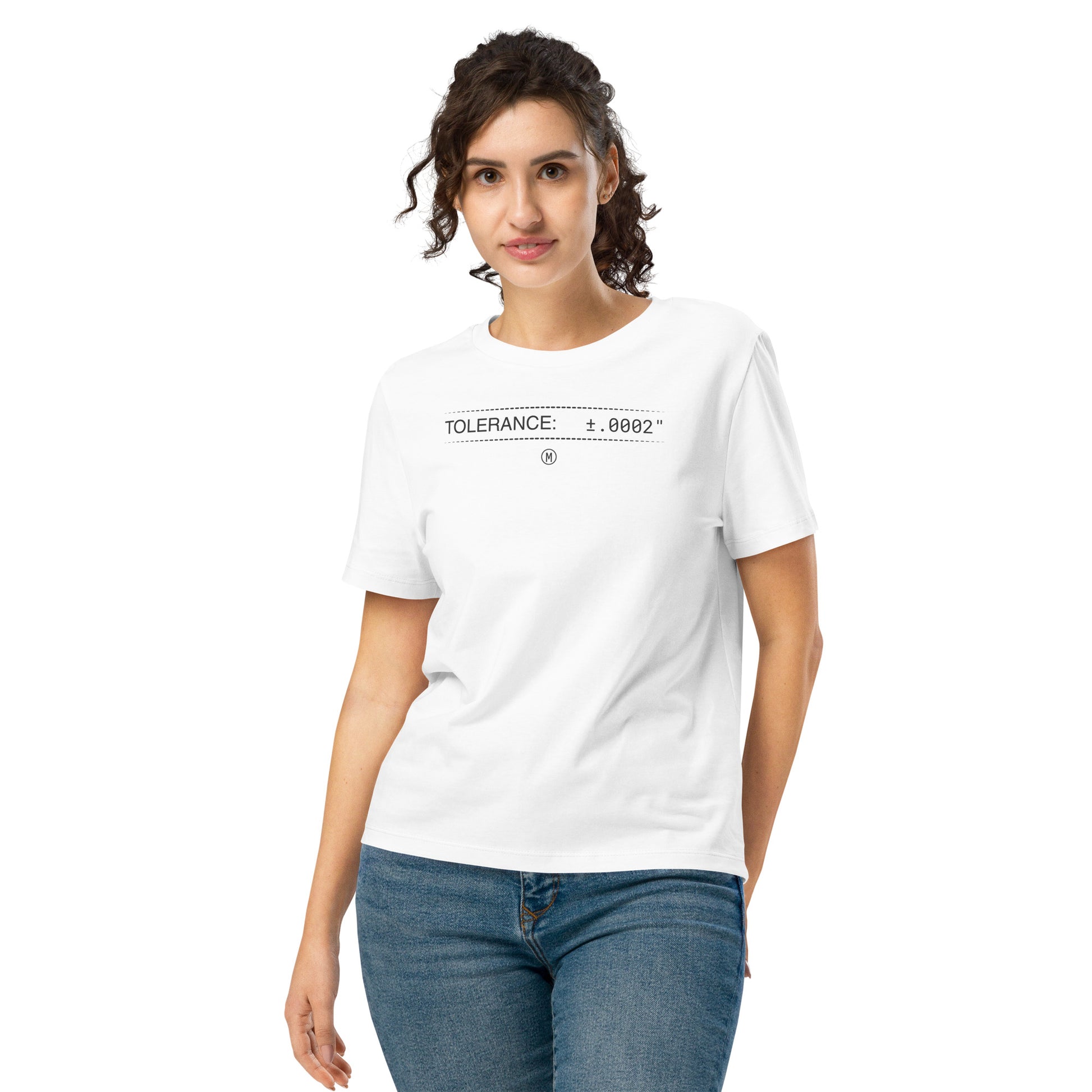 Woman in organic white premium t-shirt with text "TOLERANCE: ±.0002" for mechanical engineers.