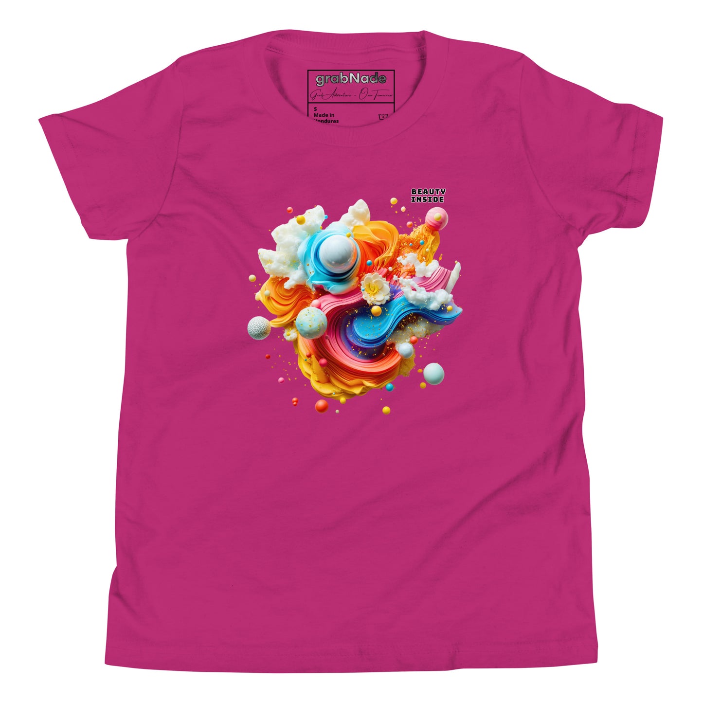 Product mockup. A pink t-shirt featuring an abstract, swirling art design at the center with vibrant strokes of yellow, orange, blue, and pink, adorned with playful 3D spheres, clouds, and flowers. Near the top right of the design, black block text reads, 'BEAUTY INSIDE.
